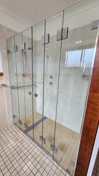 frameless-shower-screen-fold-doors-closed