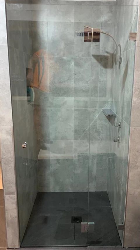 hinged-frameless-shower-screen-with-door