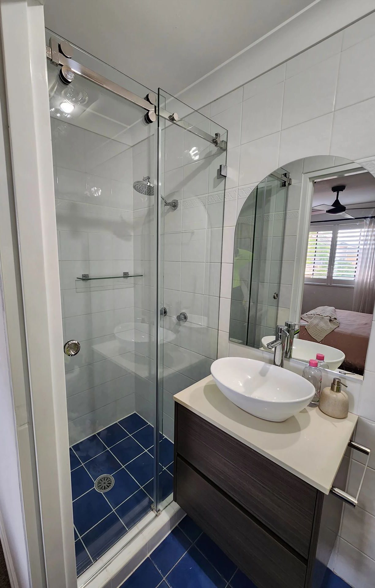 Frameless sliding shower door installed in Baulkham Hills