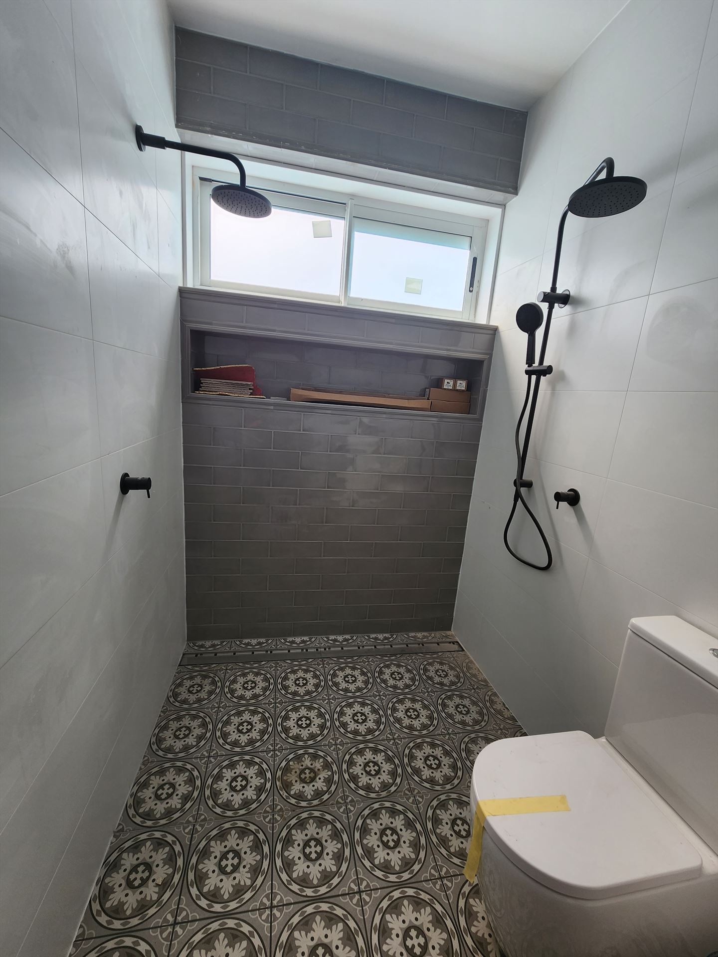 Bathroom before frameless shower screen install in Earlwood