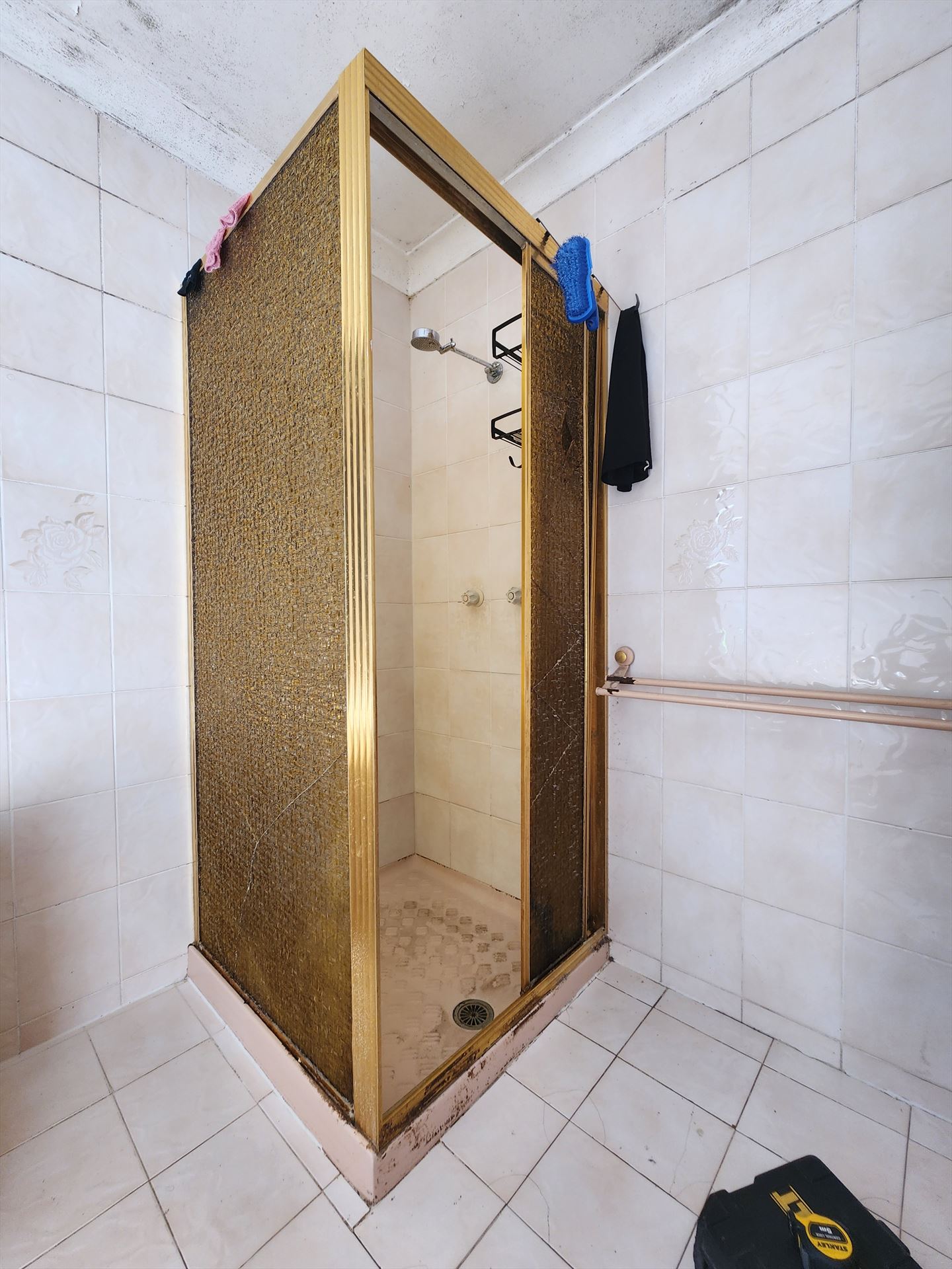 Bathroom before frameless shower screen install in Auburn