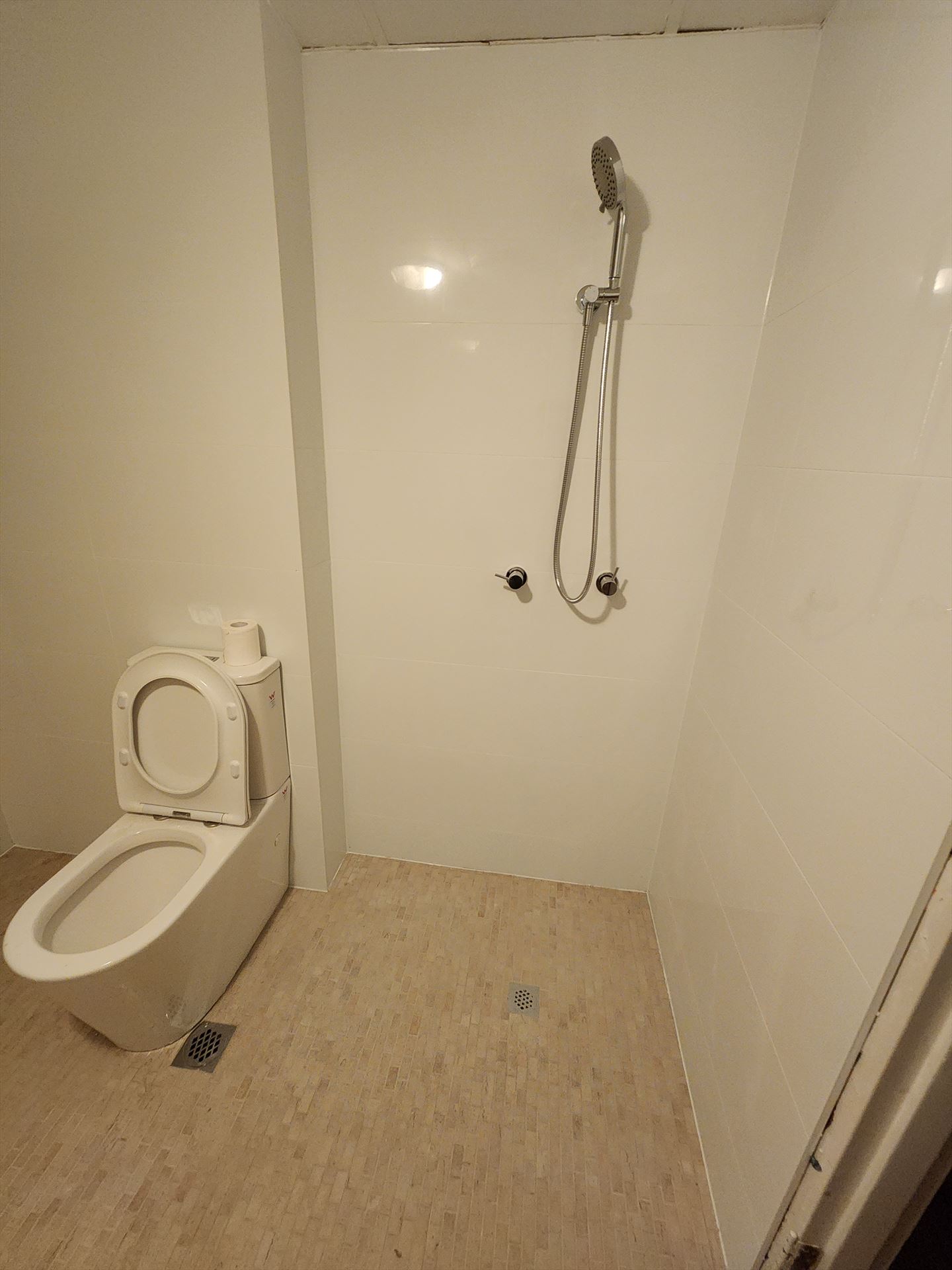 Bathroom before frameless shower screen install in Artarmon