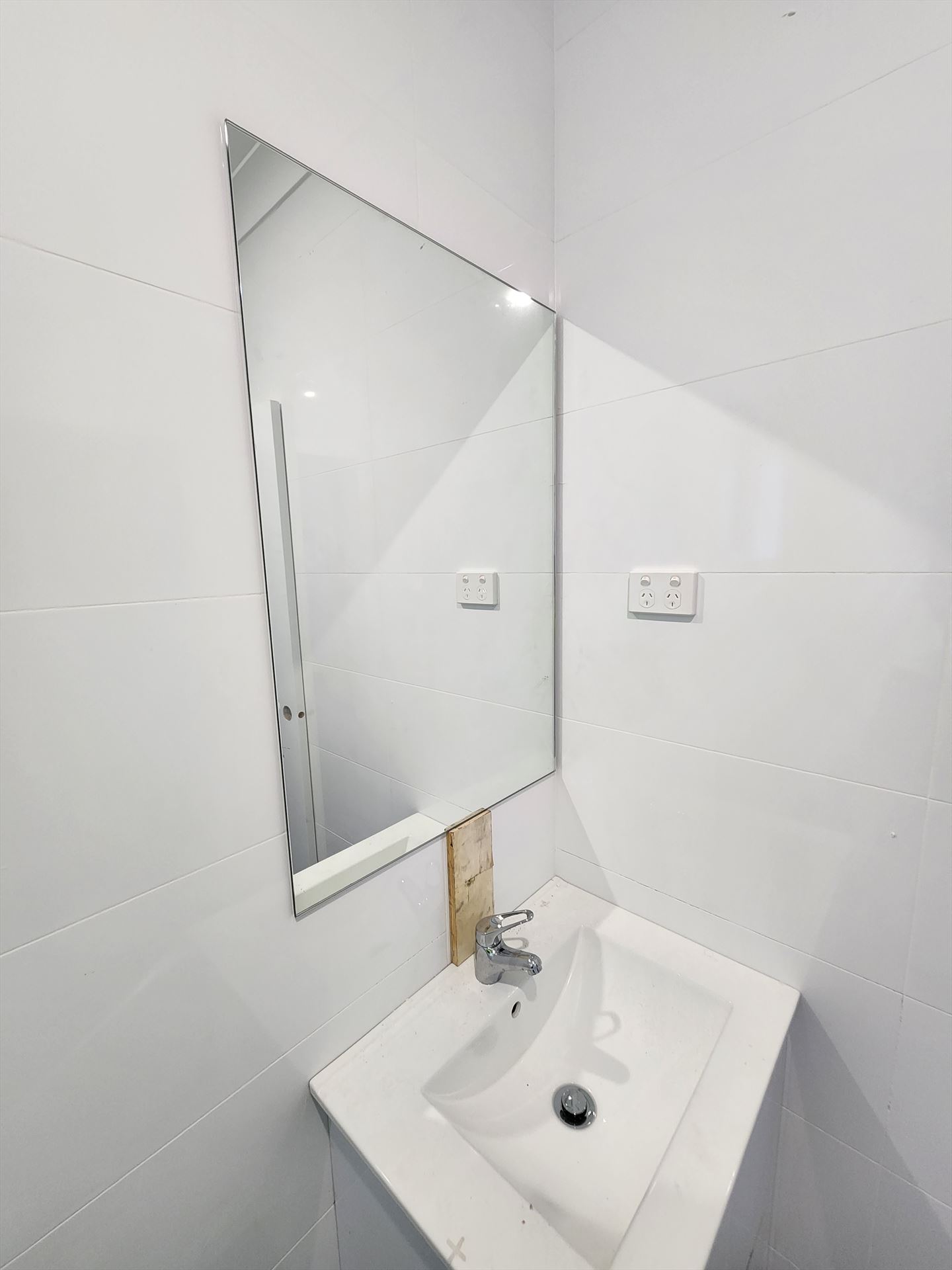 Bathroom before frameless shower screen install in Rosemeadow