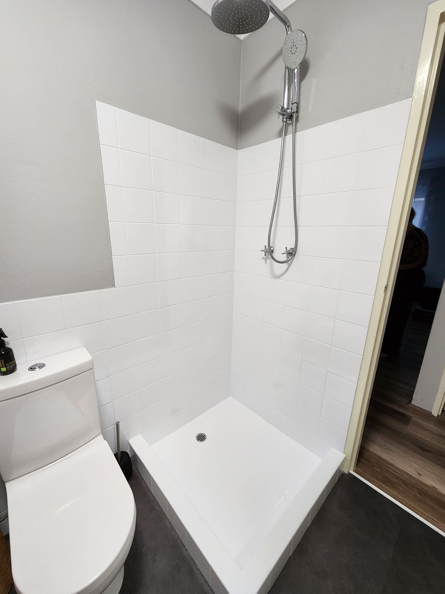 Bathroom before frameless shower screen install in Telopea