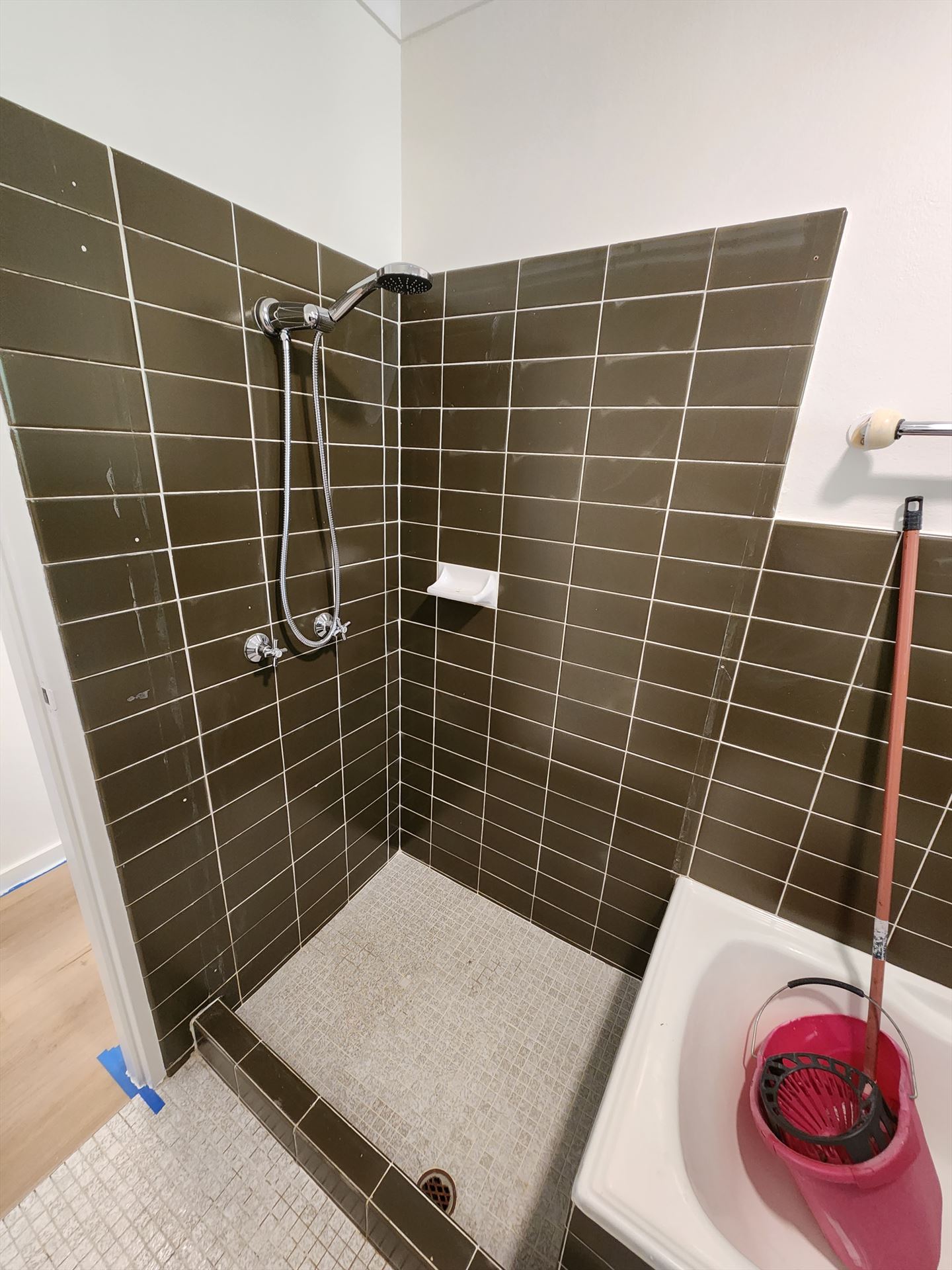 Bathroom before frameless shower screen install in Ashfield