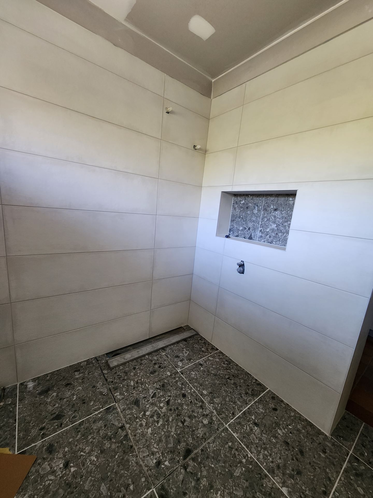 Bathroom before frameless shower screen install in Earlwood