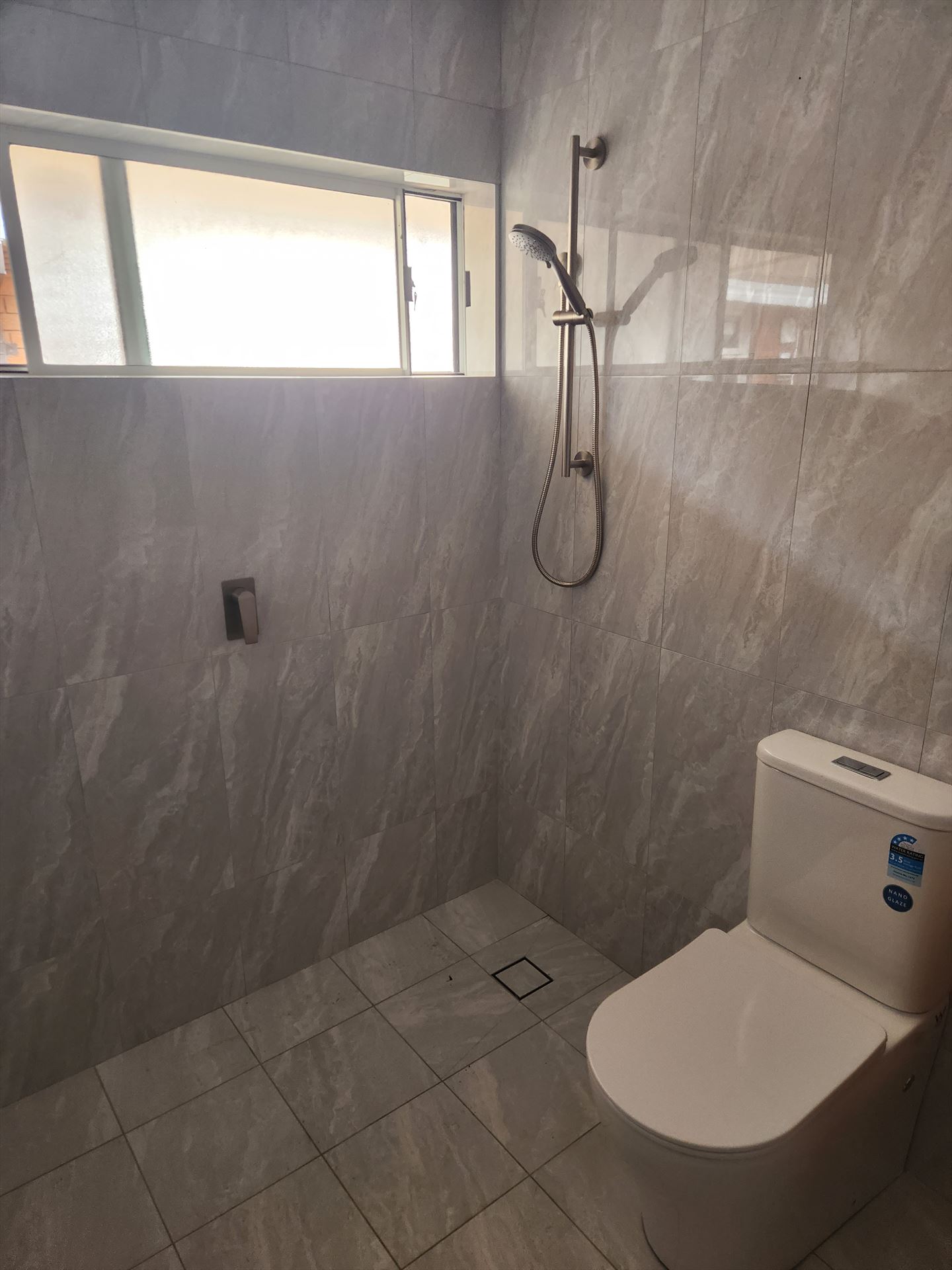 Bathroom before frameless shower screen install in Penshurst