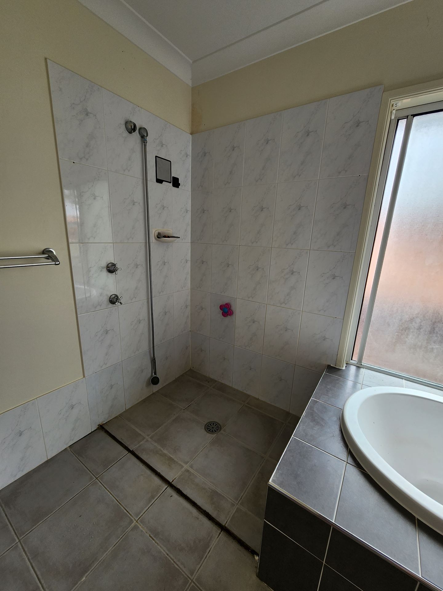 Bathroom before frameless shower screen install in Kings Langley