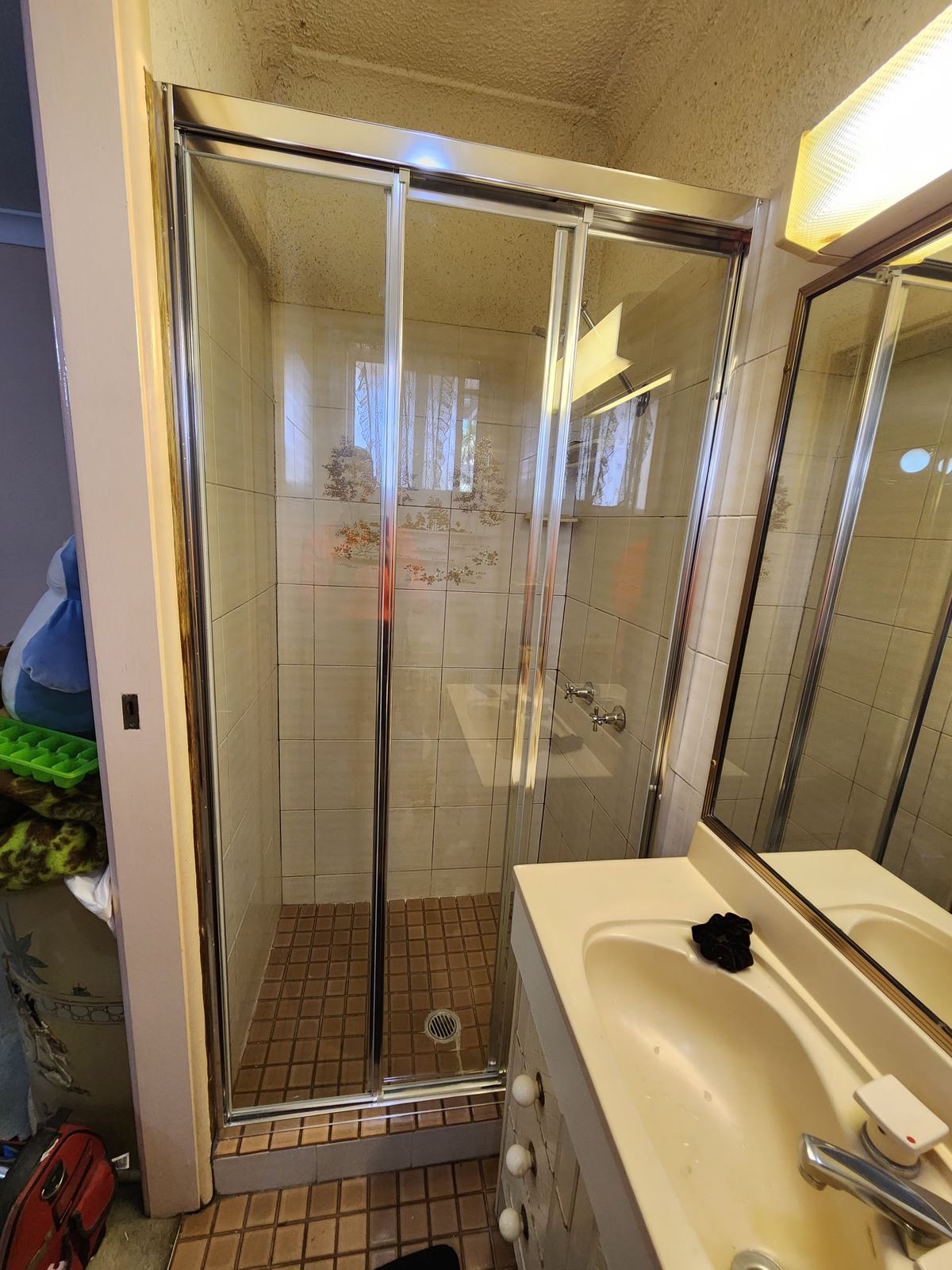 fully shower screen with chrome hardware installed in Greystanes by Showerland