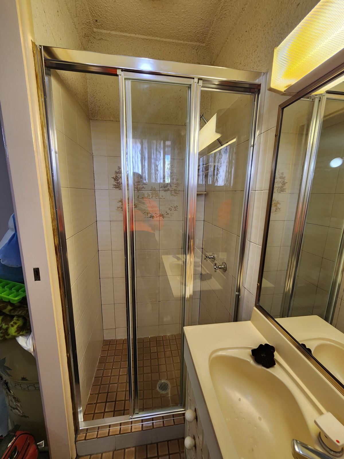 fully shower screen with chrome hardware installed in Greystanes by Showerland
