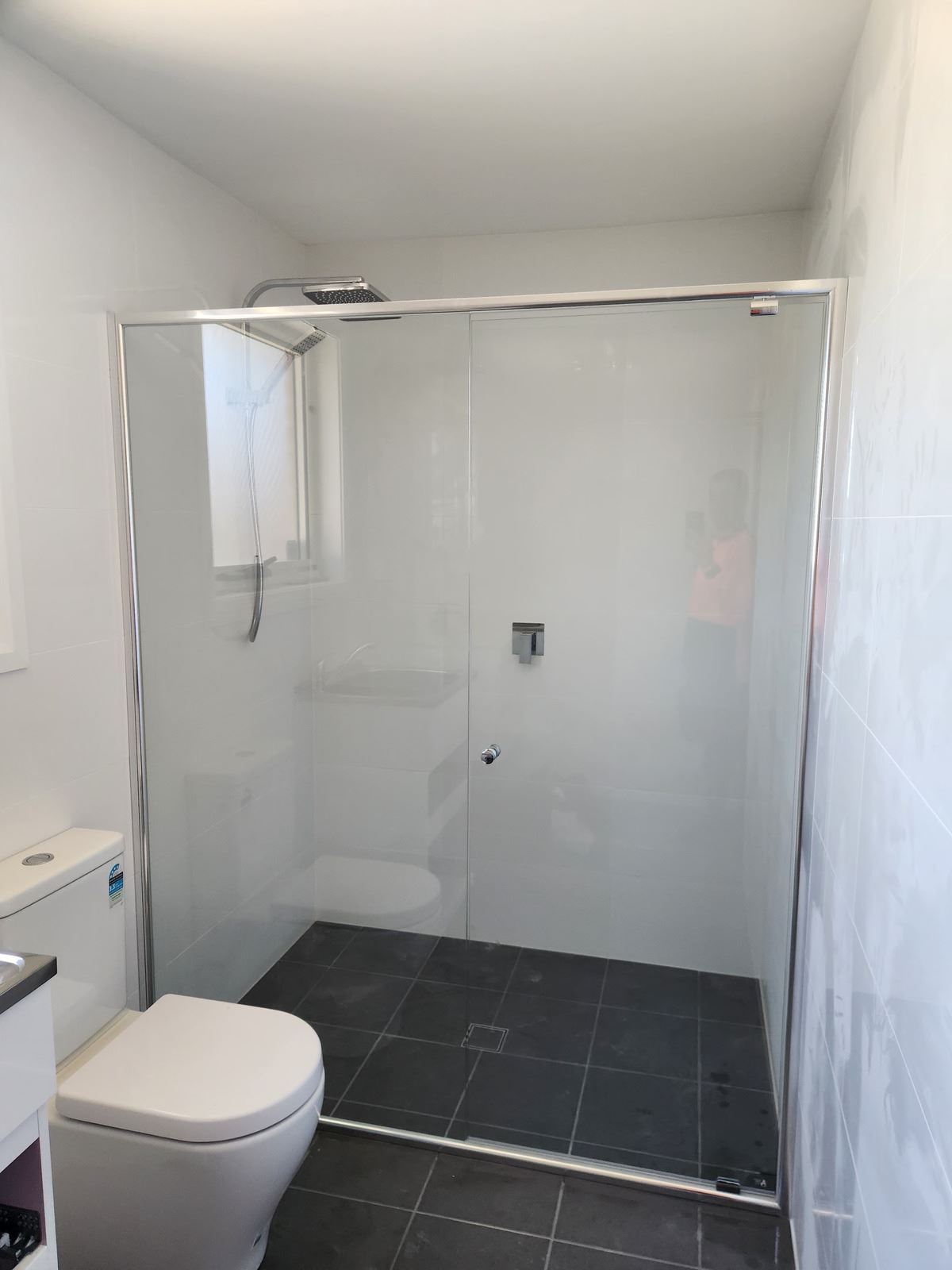 semi shower screen with chrome hardware installed in Woodcroft by Showerland