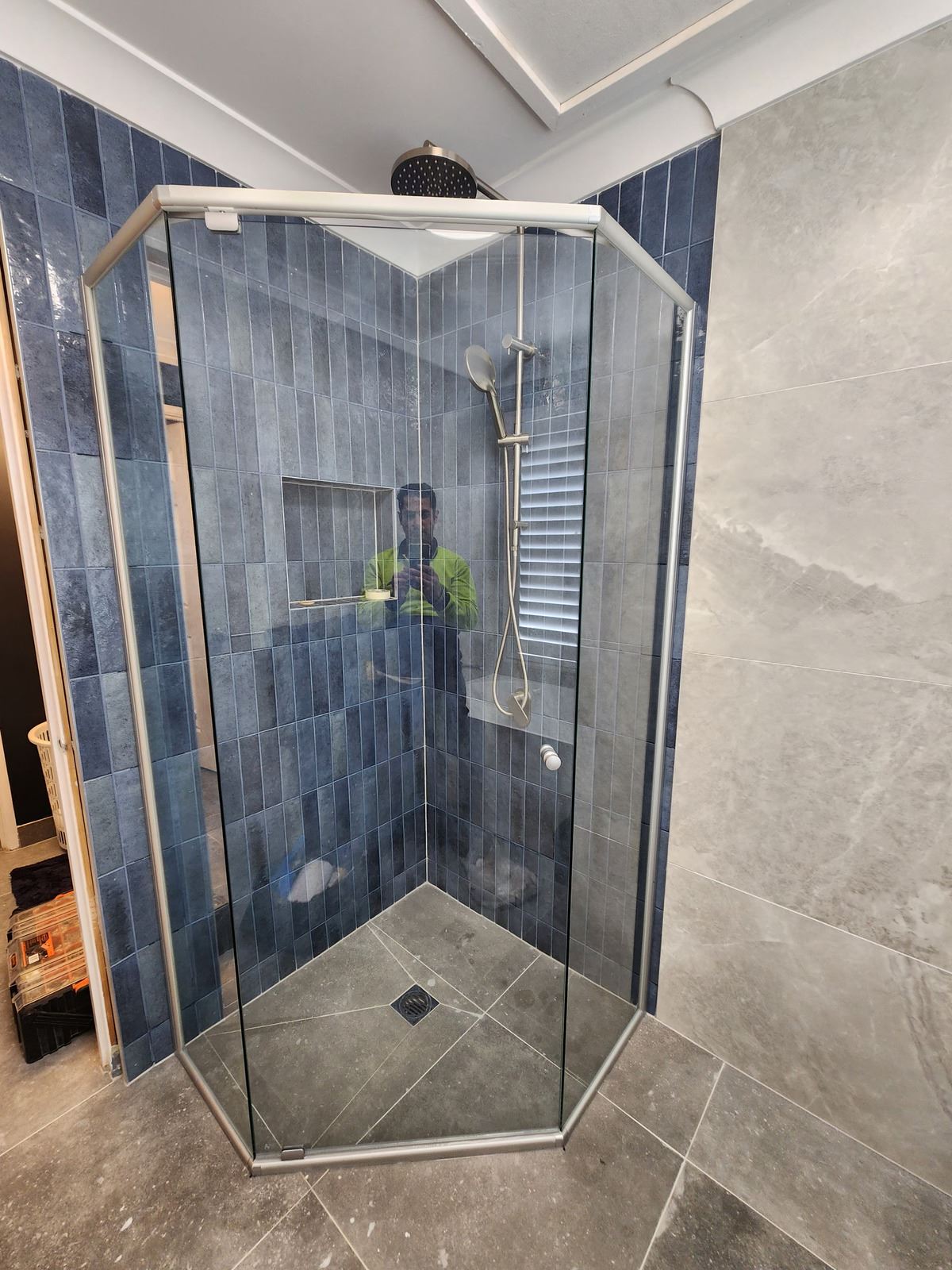 semi shower screen with white hardware installed in Kellyville by Showerland