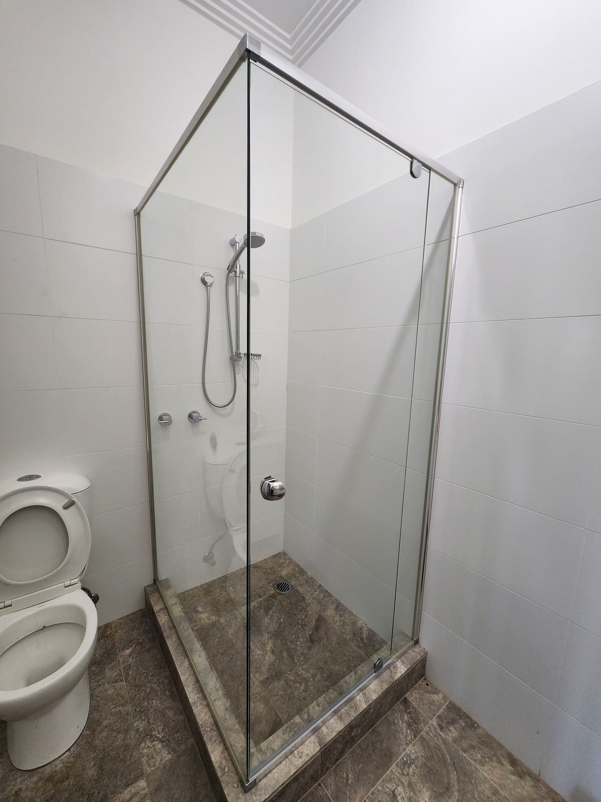 semi shower screen with chrome hardware installed in Kenthurst by Showerland