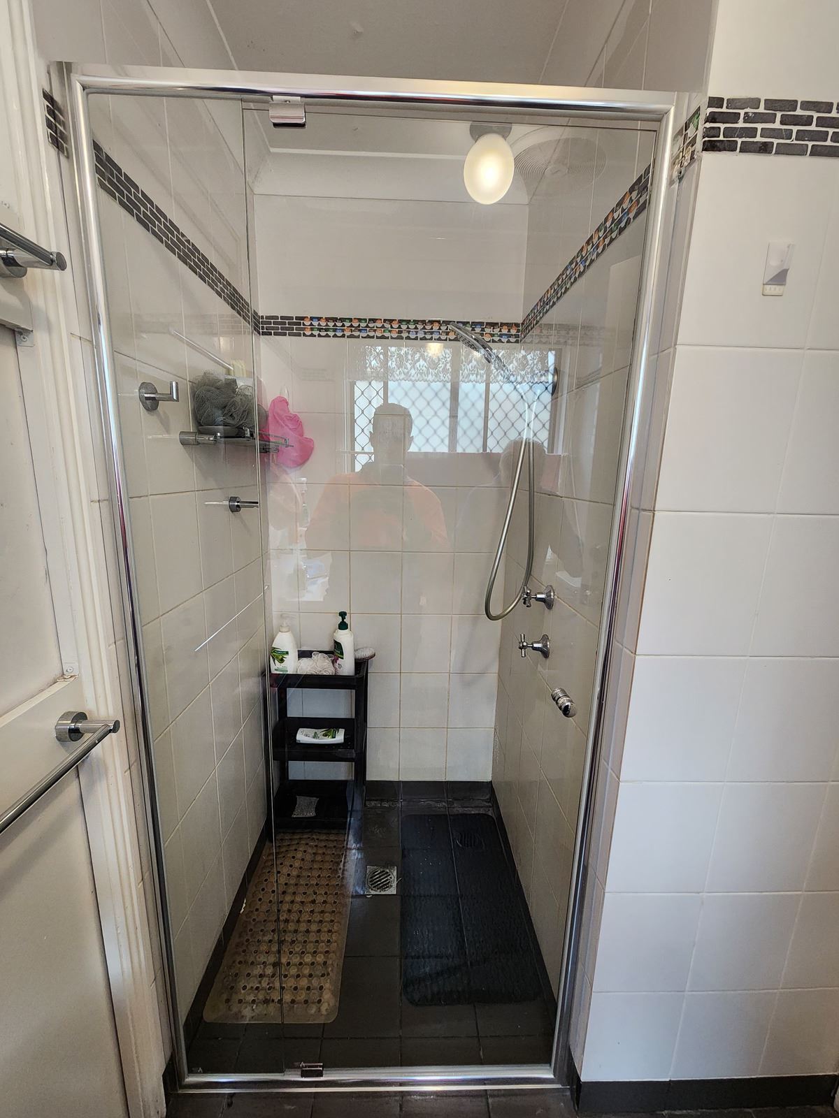 semi shower screen with chrome hardware installed in Doonside by Showerland
