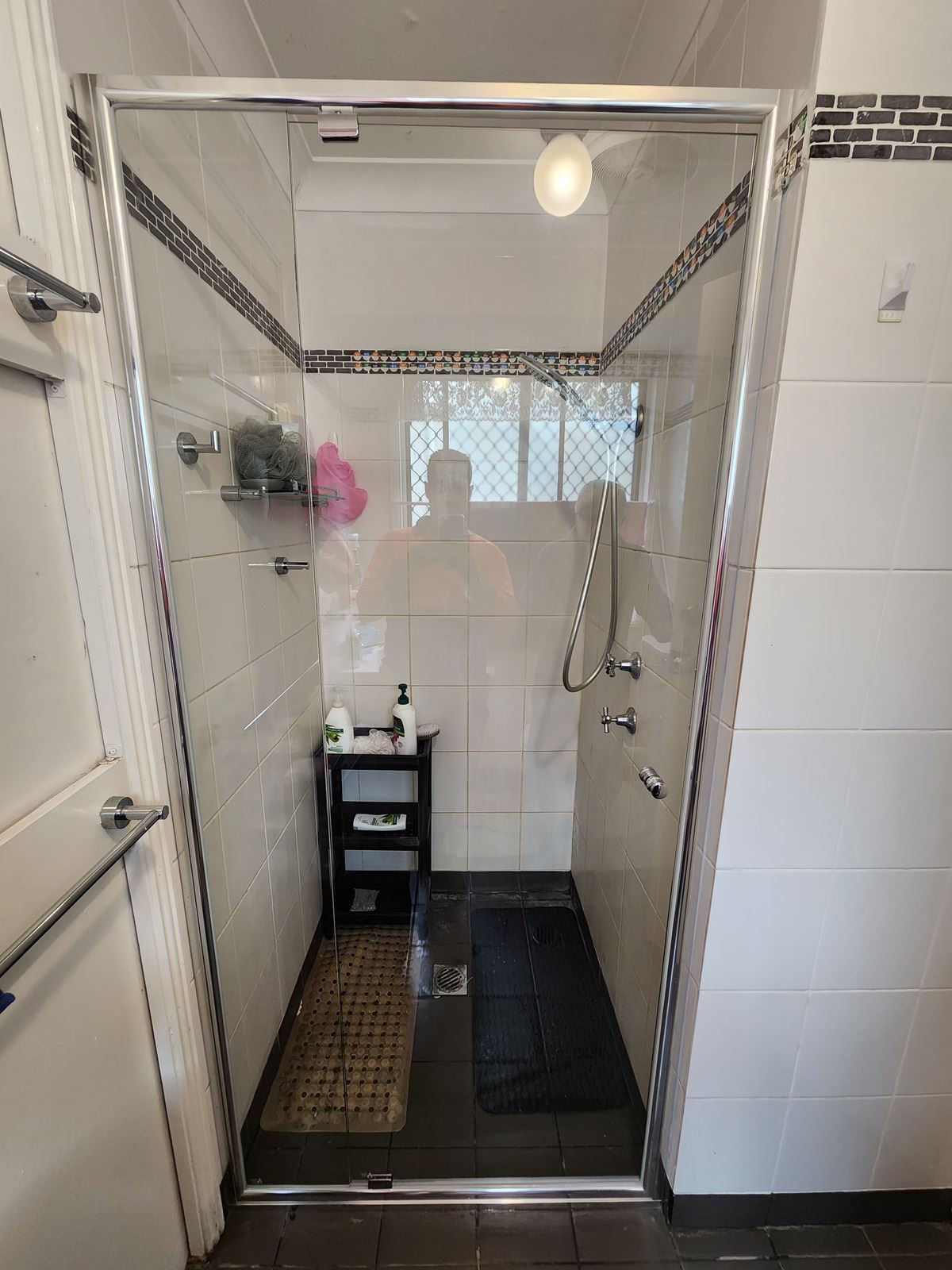 semi shower screen with chrome hardware installed in Doonside by Showerland