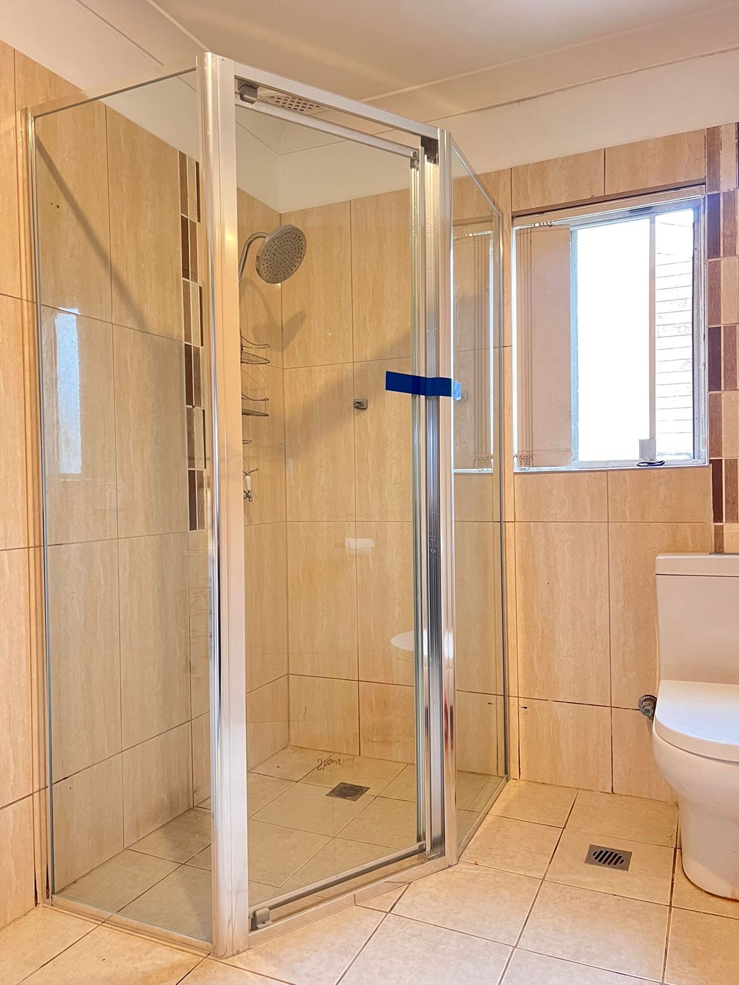 fully shower screen with chrome hardware installed in St Marys by Showerland