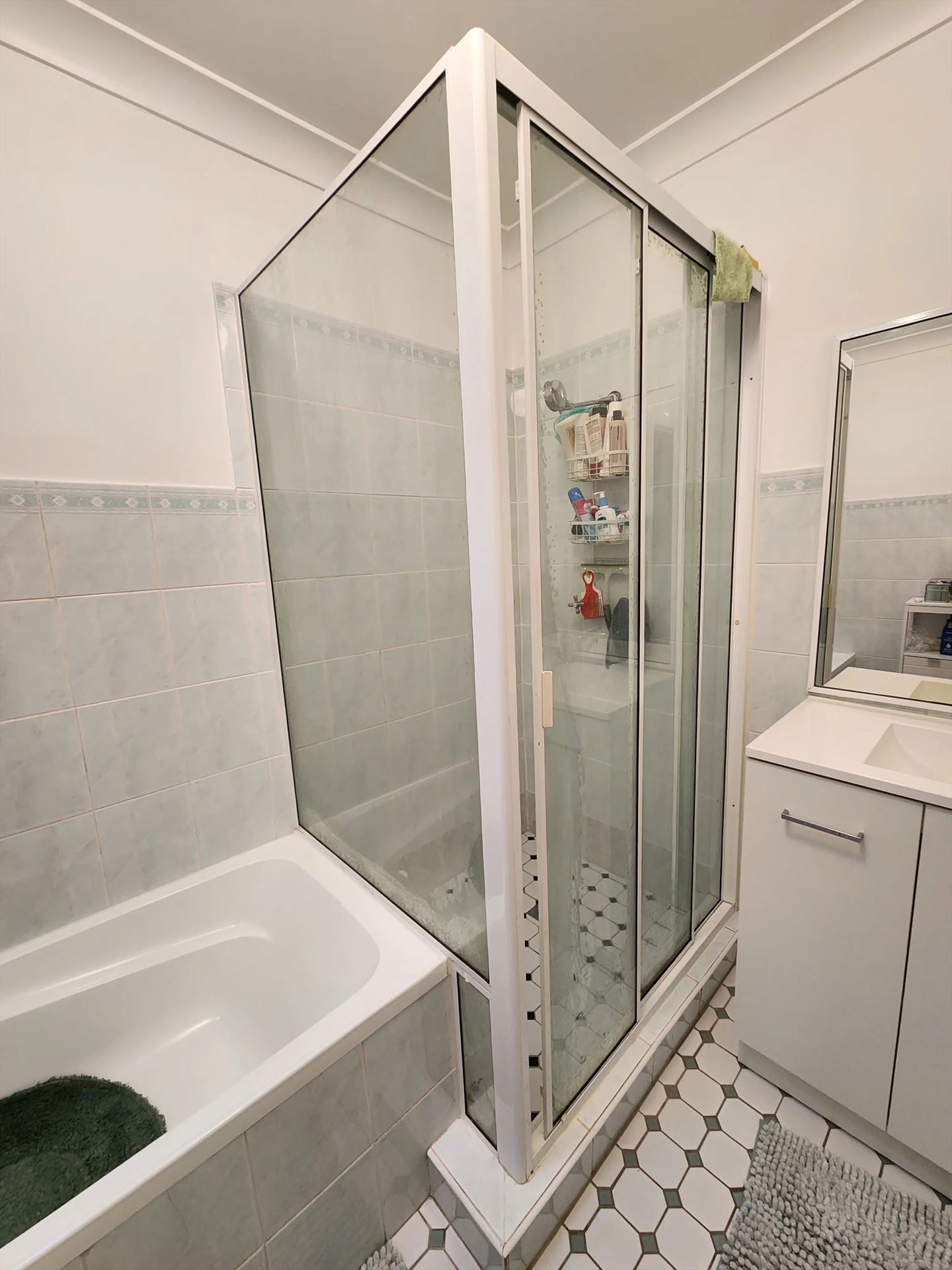 fully shower screen with white hardware installed in Northmead by Showerland