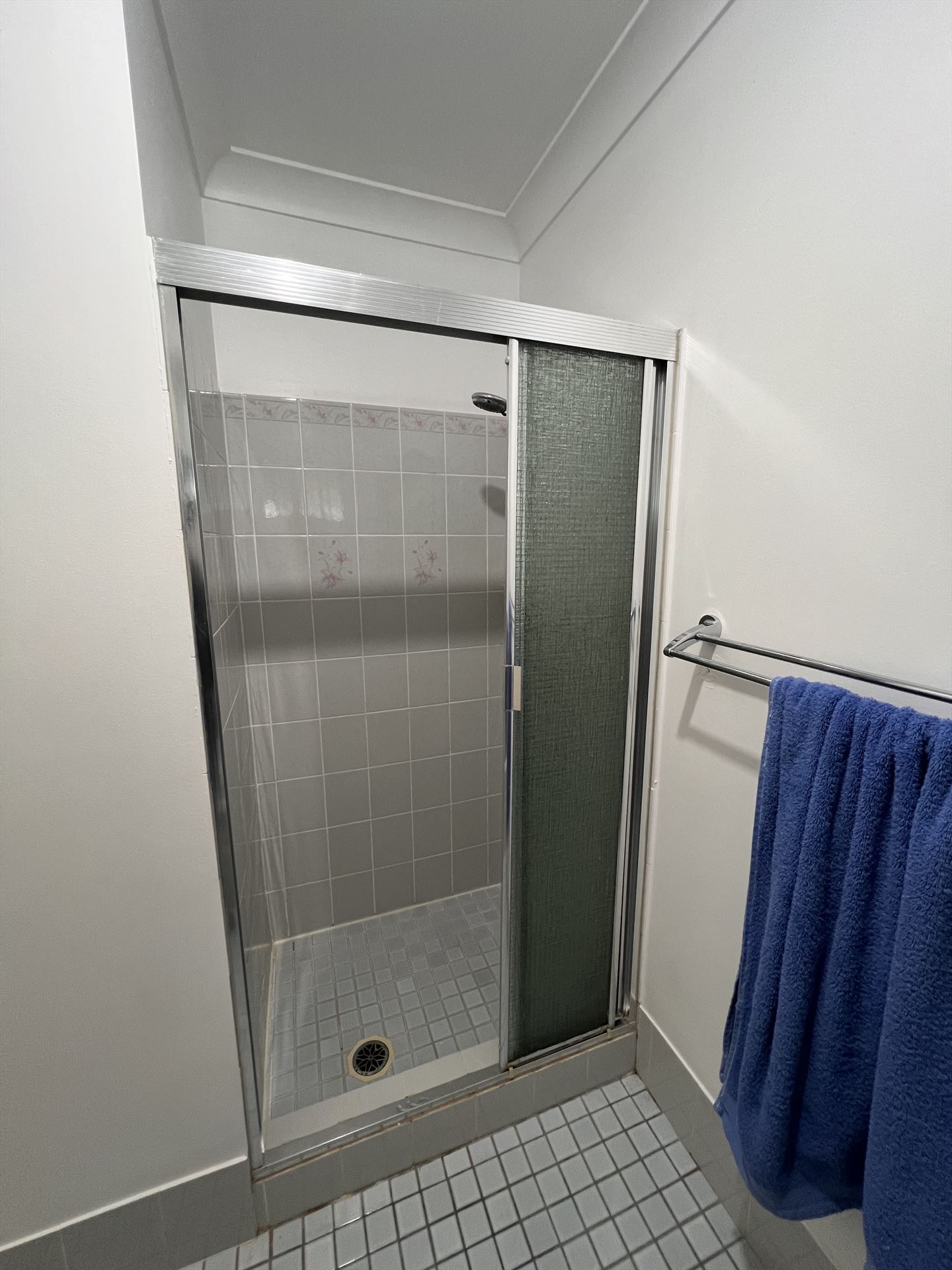 Bathroom before frameless shower screen install in Blue Haven