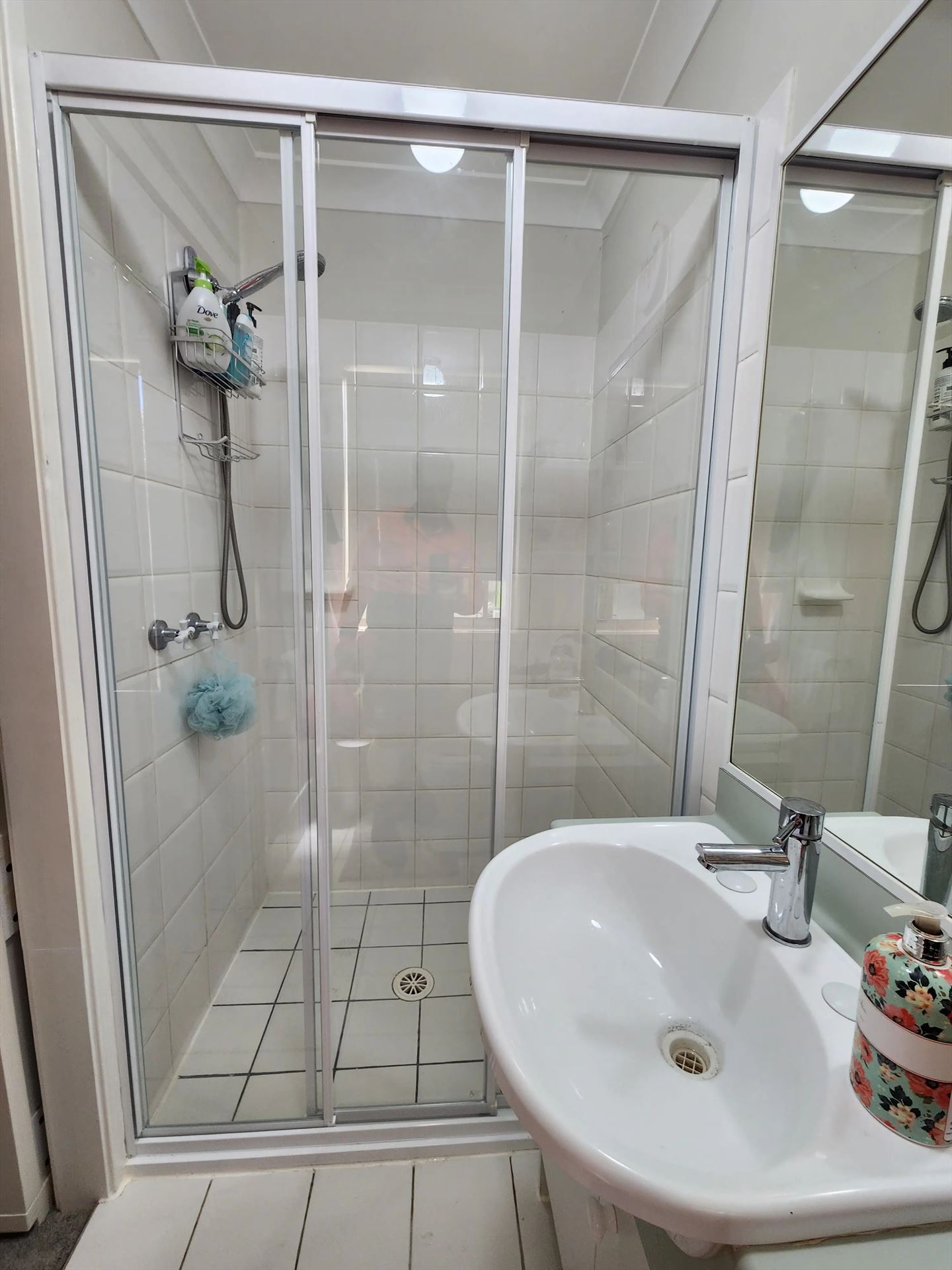 fully shower screen with white hardware installed in Stanhope Gardens by Showerland