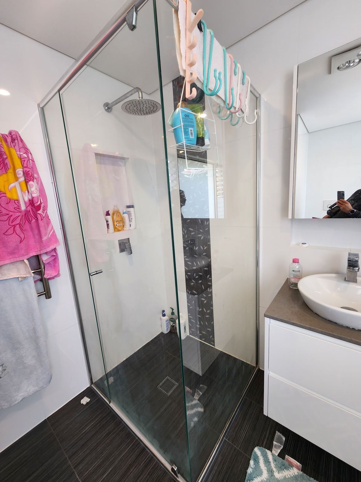 semi shower screen with chrome hardware installed in Loftus by Showerland