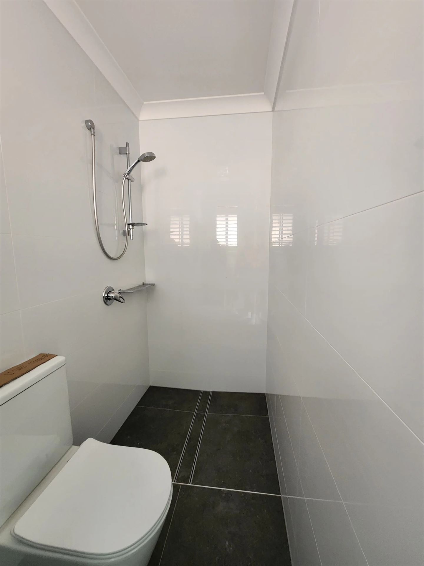 Bathroom before frameless shower screen install in Baulkham Hills
