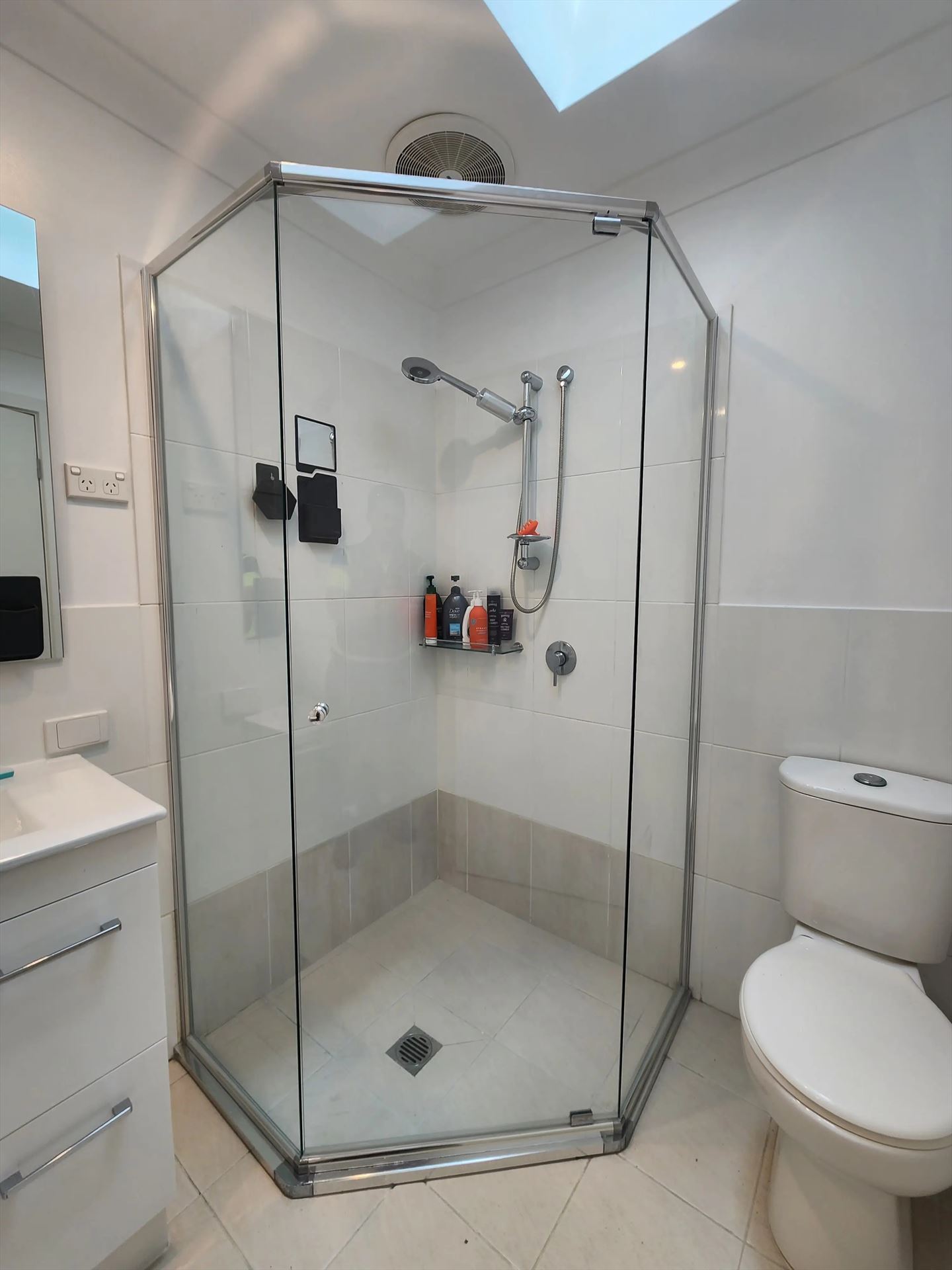semi shower screen with chrome hardware installed in Kellyville Ridge by Showerland