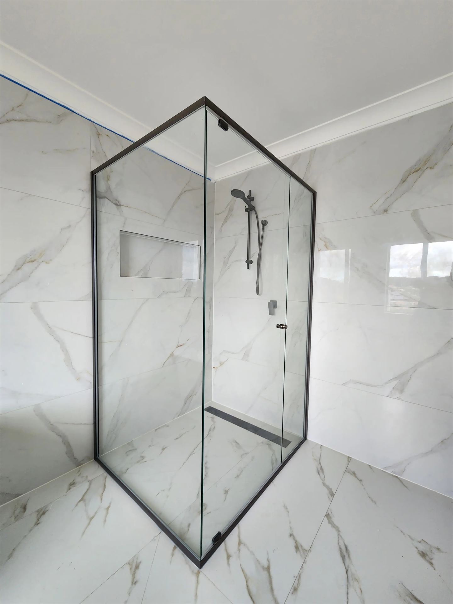 semi shower screen with black hardware installed in Glenwood by Showerland