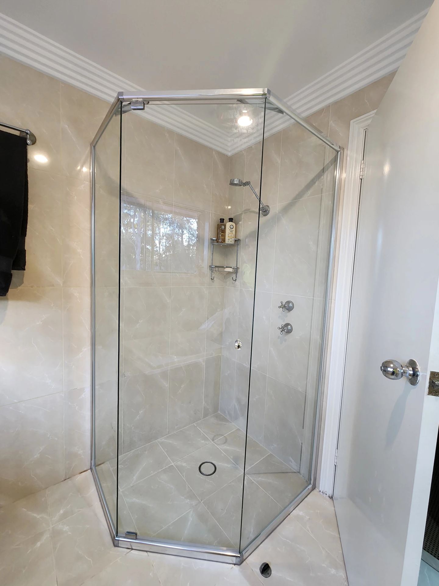 semi shower screen with chrome hardware installed in Castle Hill by Showerland