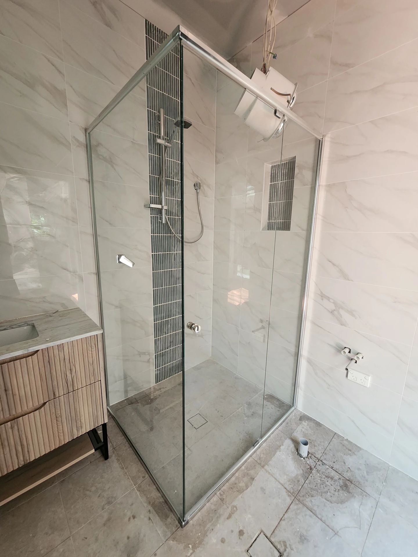semi shower screen with chrome hardware installed in Newport by Showerland