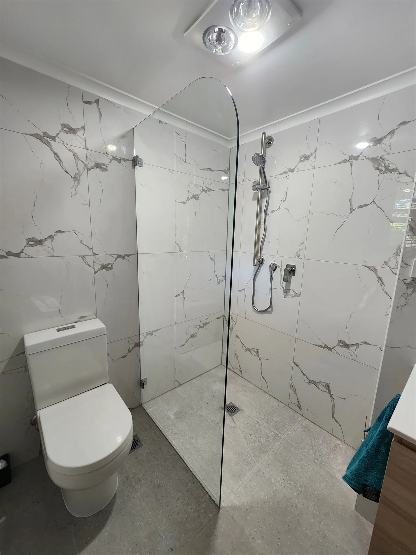 frameless shower screen with chrome hardware installed in Cherrybrook by Showerland