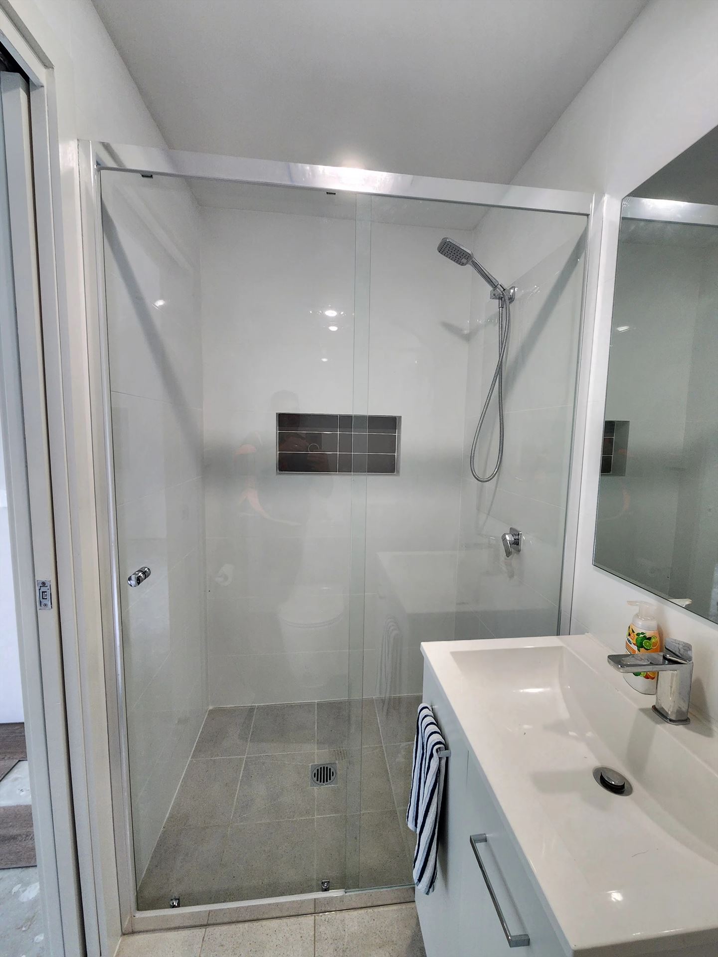 semi shower screen with chrome hardware installed in Old Toongabbie by Showerland