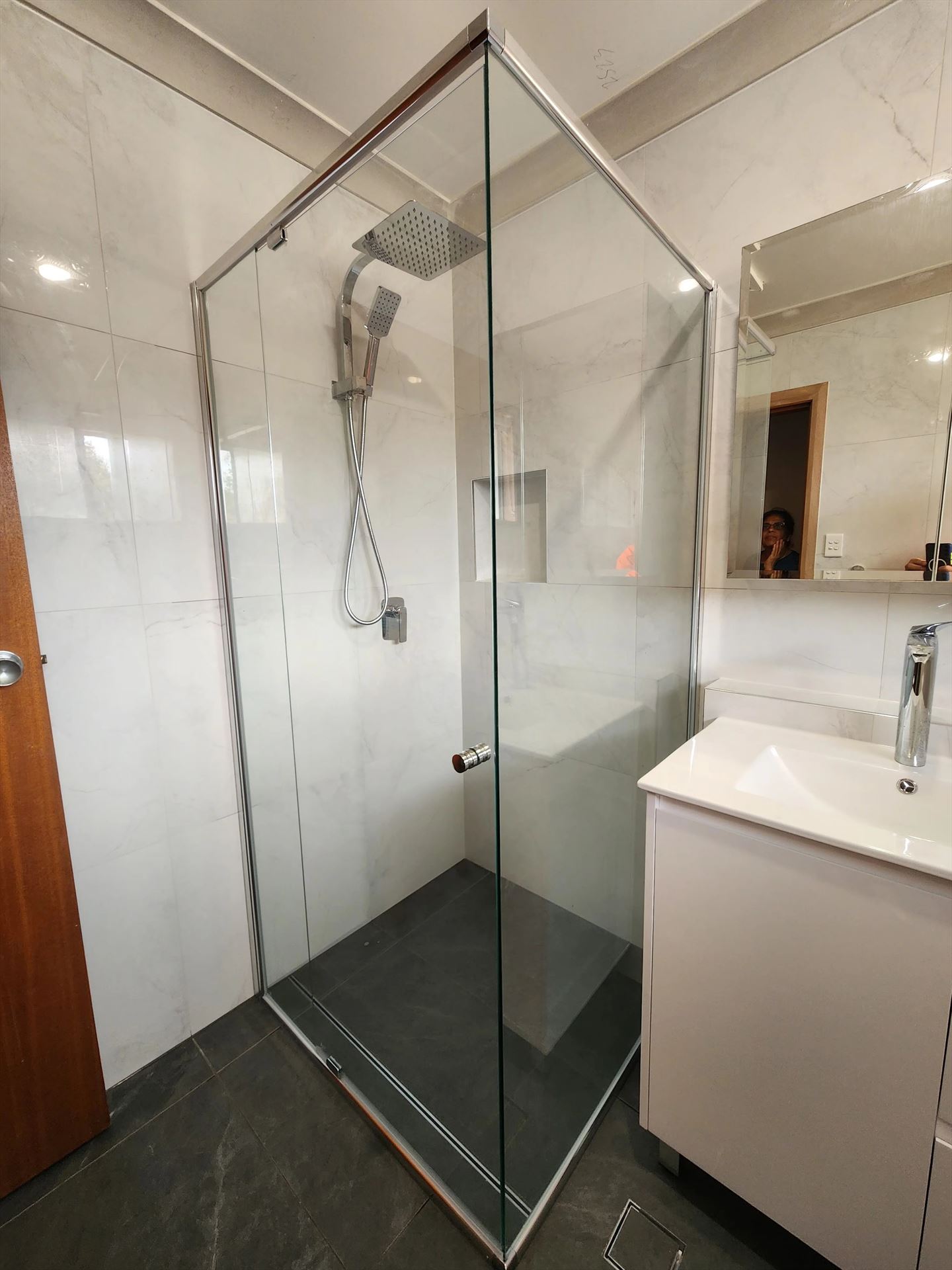 semi shower screen with chrome hardware installed in Padstow by Showerland