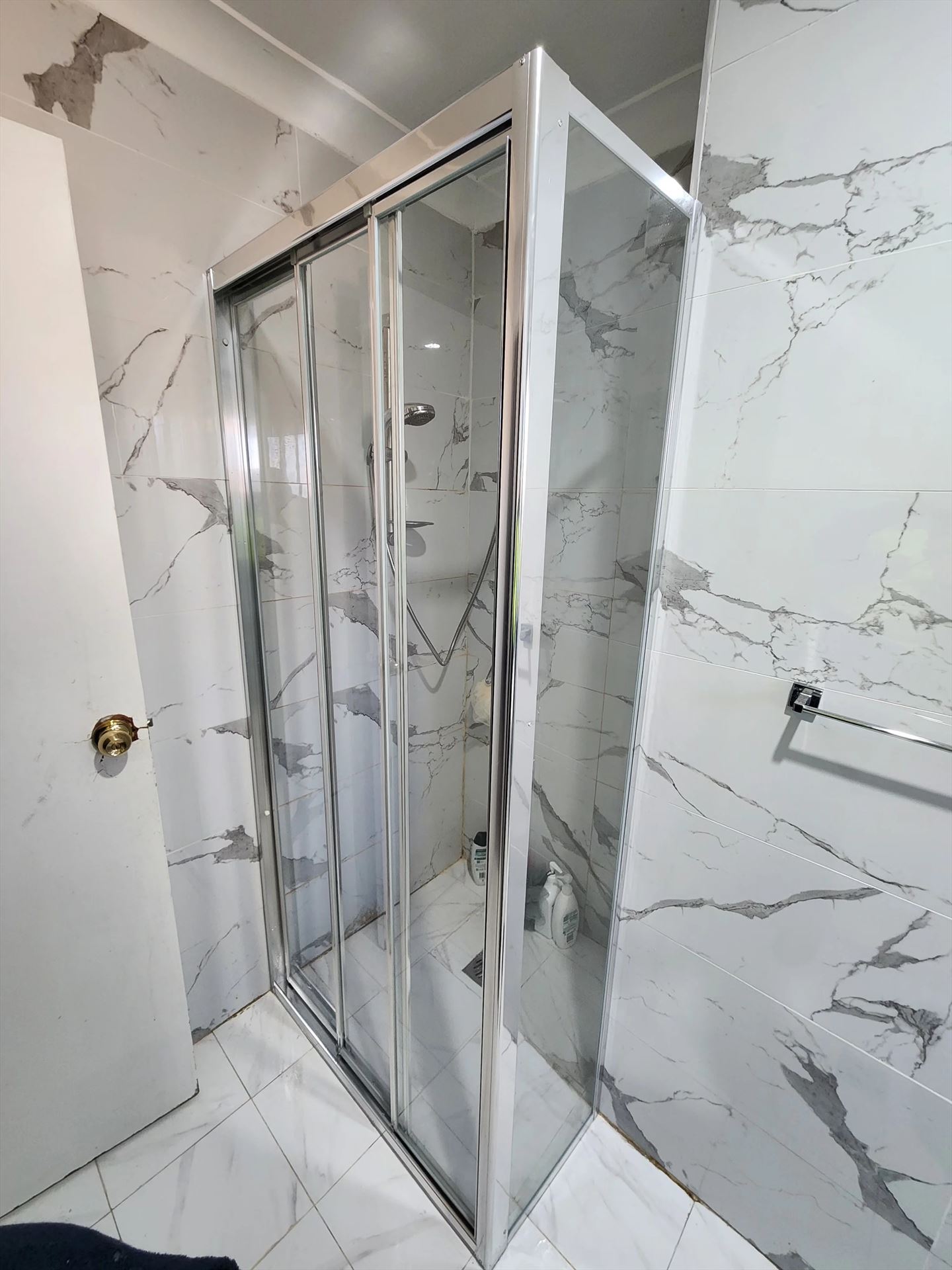 fully shower screen with chrome hardware installed in Glendenning by Showerland