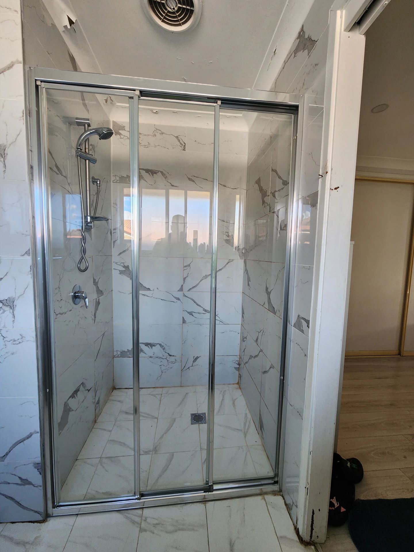 fully shower screen with chrome hardware installed in Glendenning by Showerland