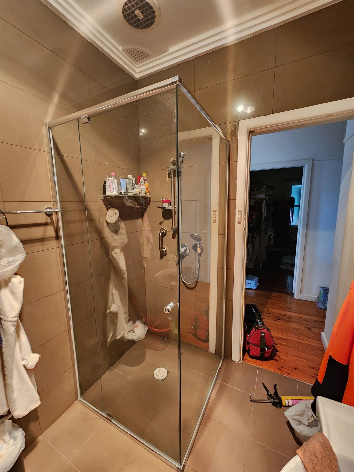 semi shower screen with chrome hardware installed in Ermington by Showerland