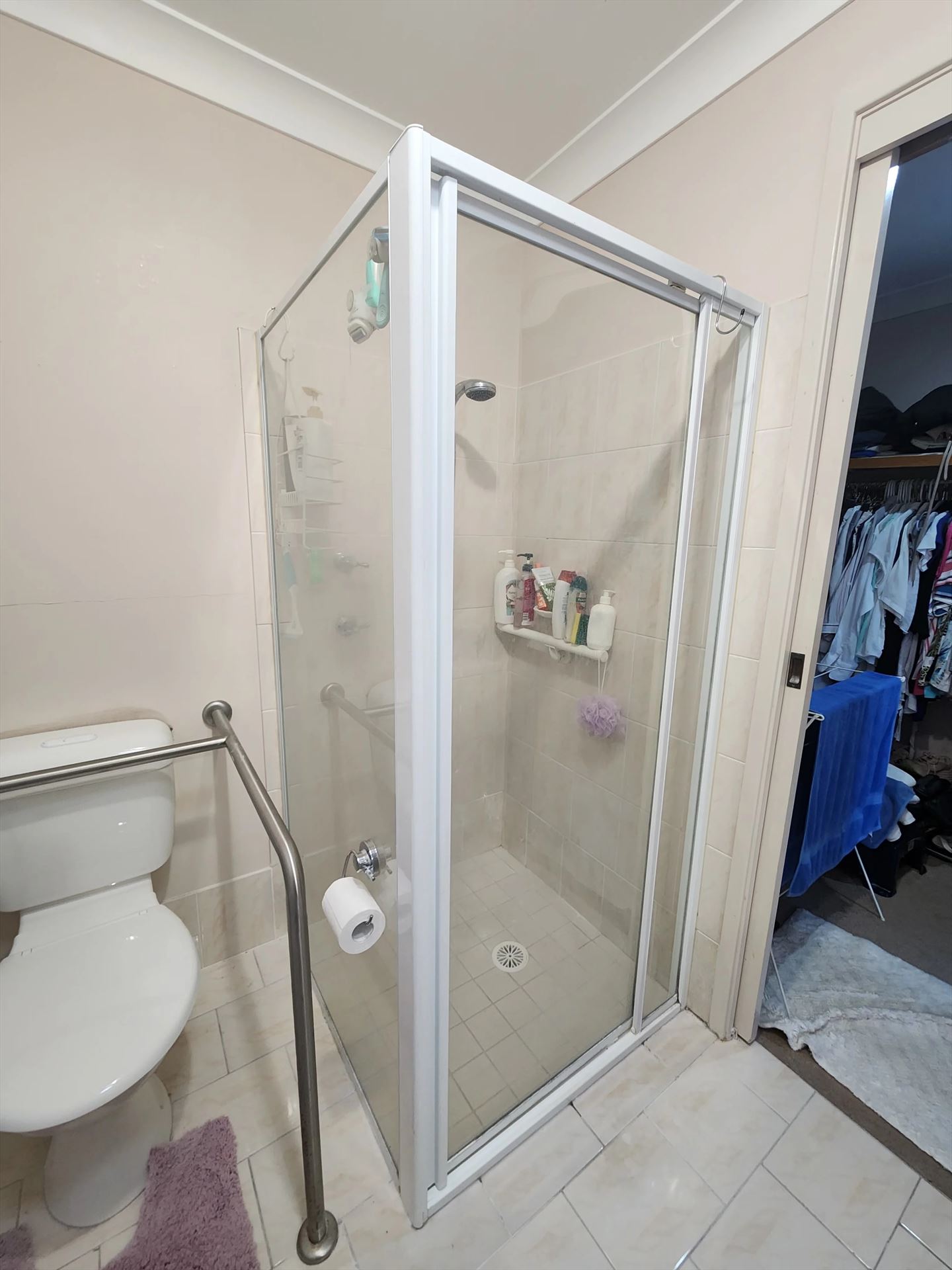 fully shower screen with white hardware installed in Erskine Park by Showerland