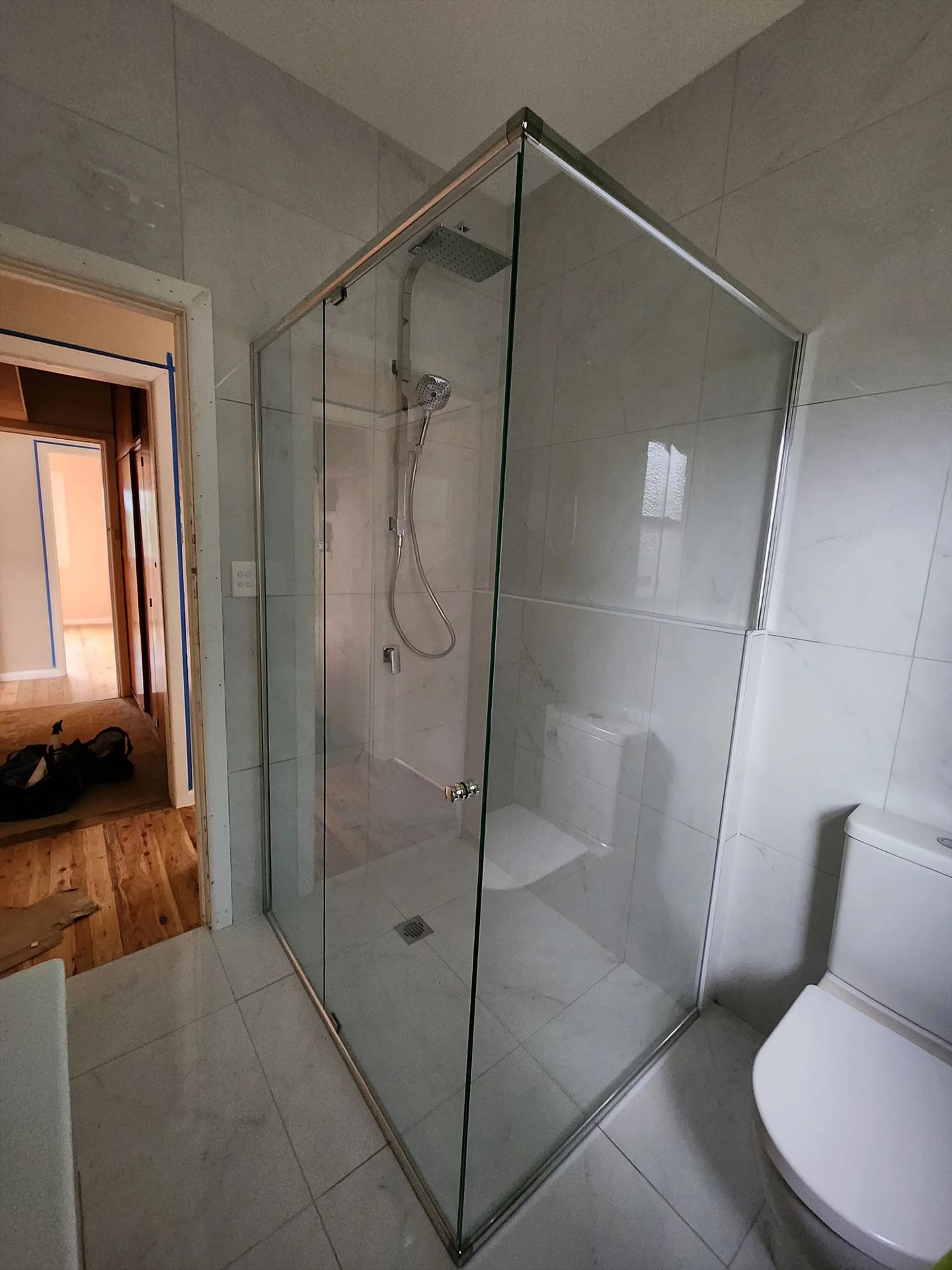 semi shower screen with chrome hardware installed in Blacktown by Showerland