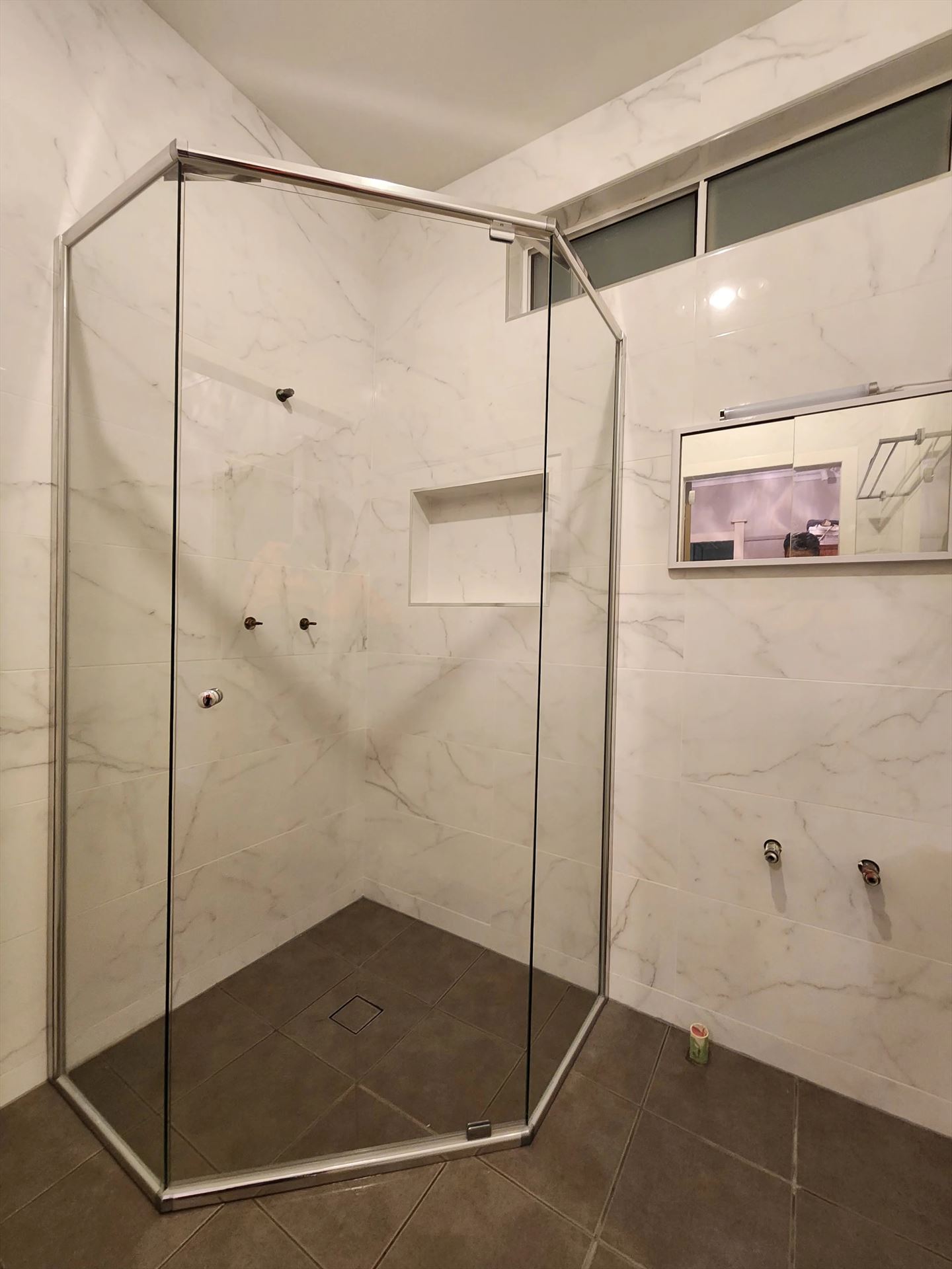 semi shower screen with chrome hardware installed in Riverstone by Showerland