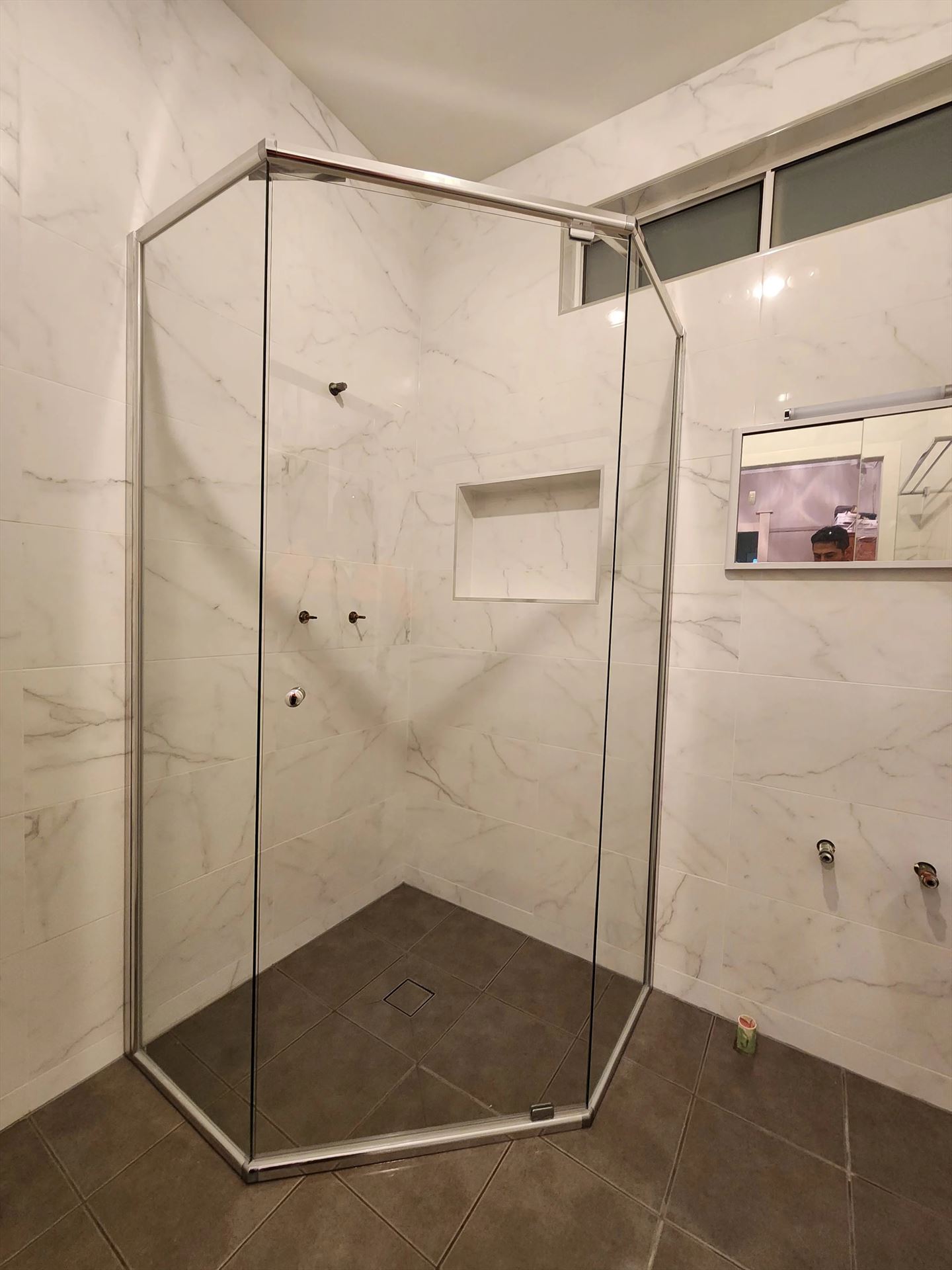 semi shower screen with chrome hardware installed in Riverstone by Showerland