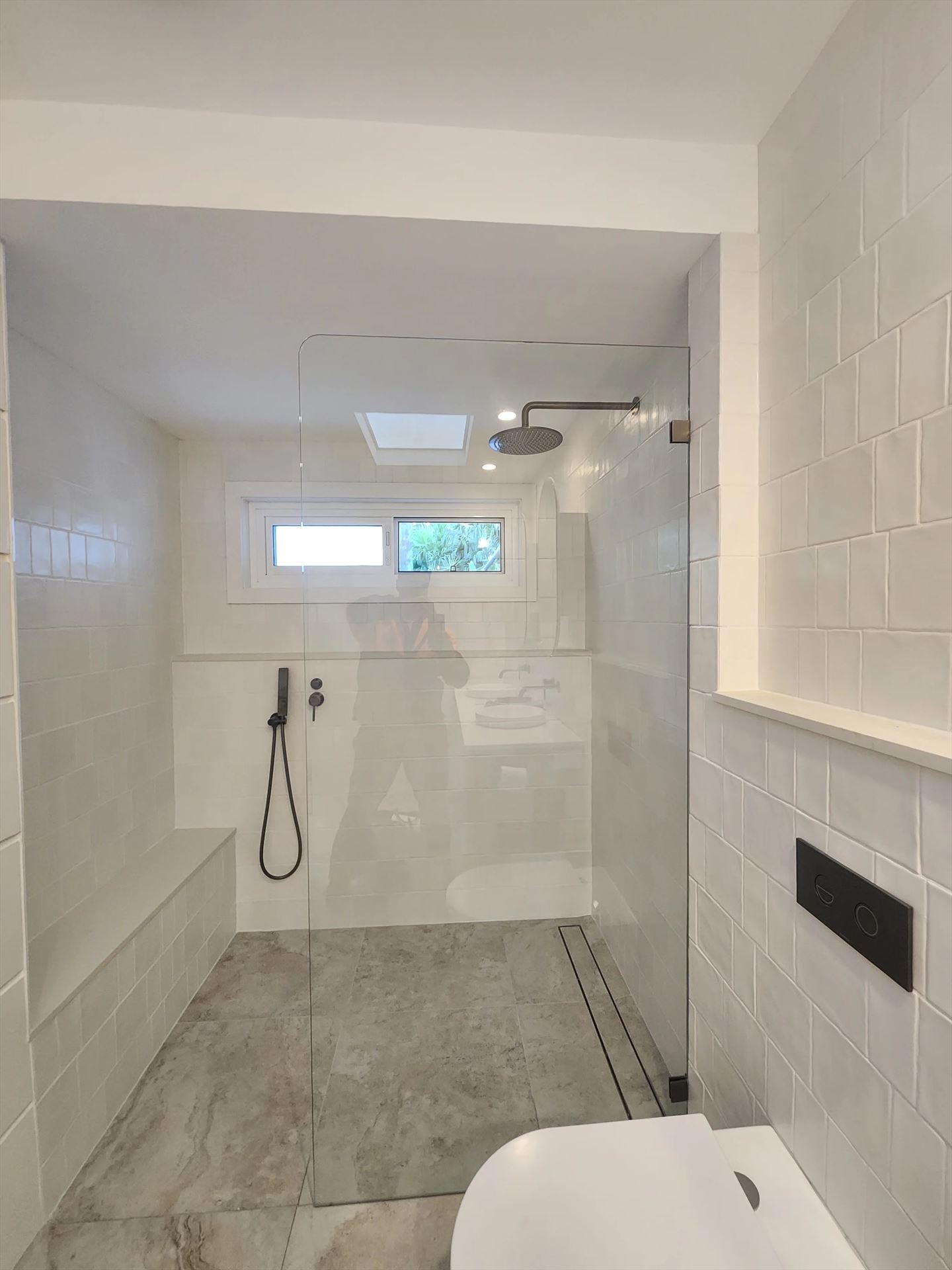 frameless shower screen with chrome hardware installed in Bilgola Plateau by Showerland