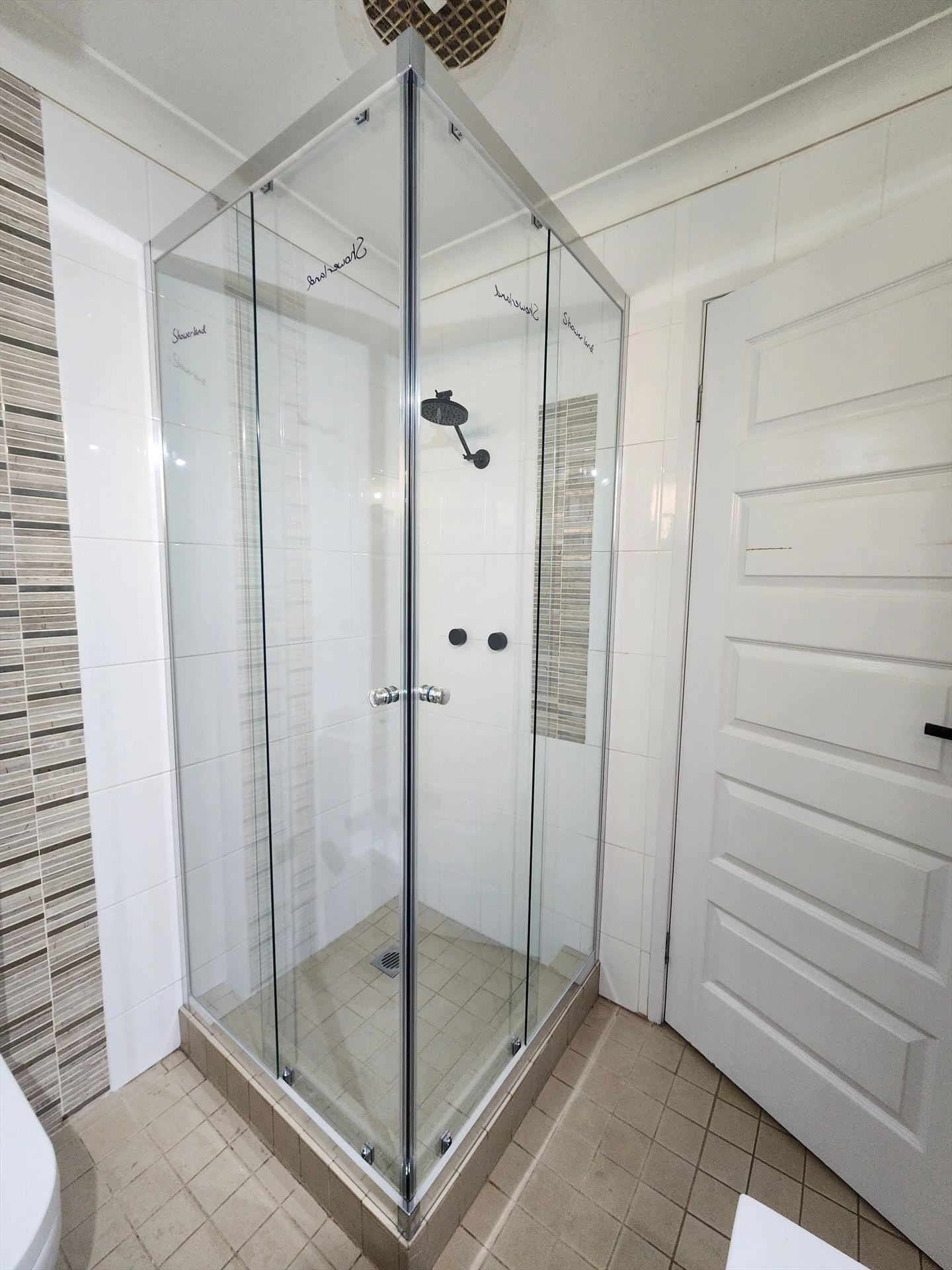 semi shower screen with chrome hardware installed in Quakers Hill by Showerland
