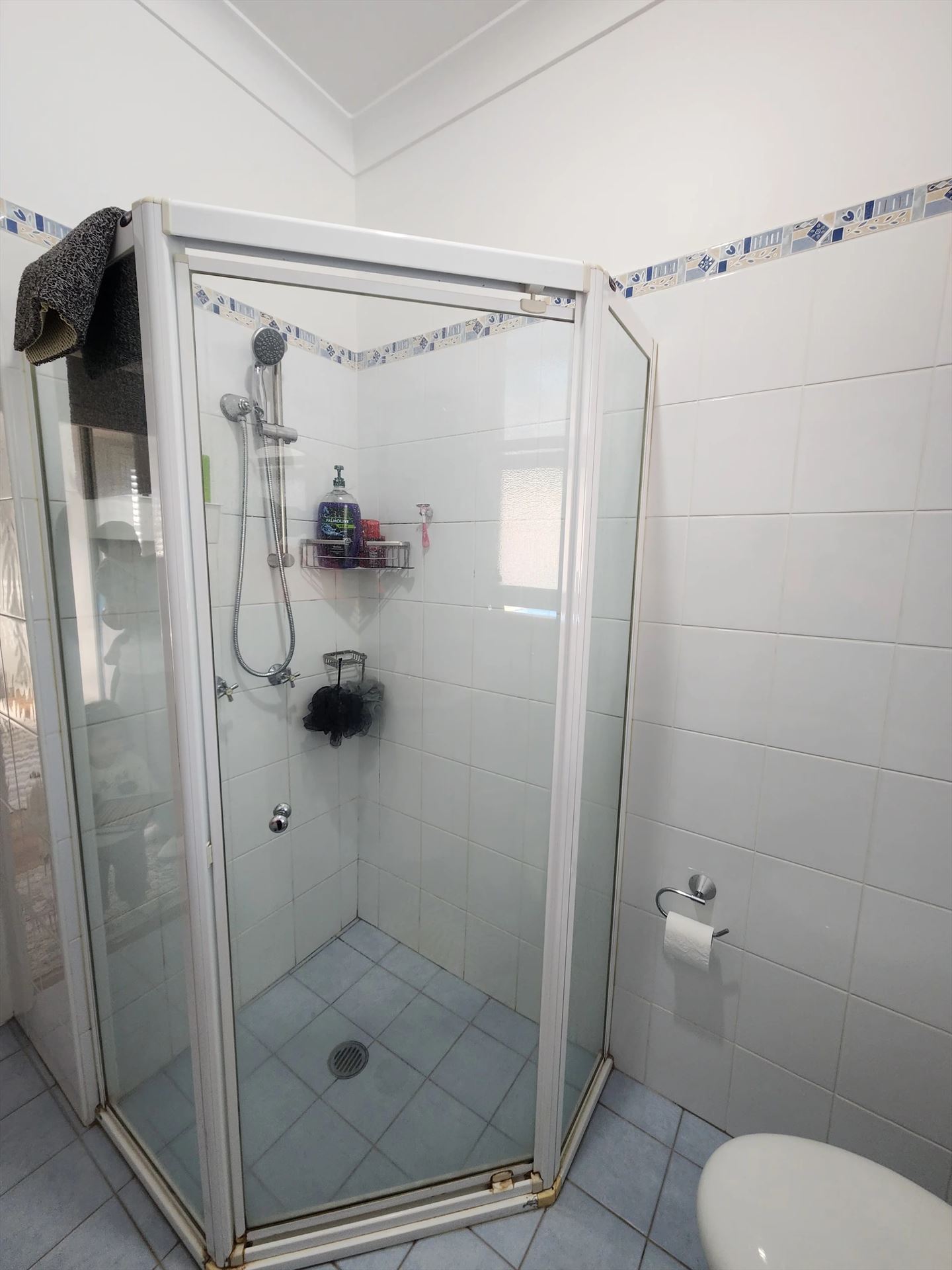 fully shower screen with white hardware installed in Lalor Park by Showerland