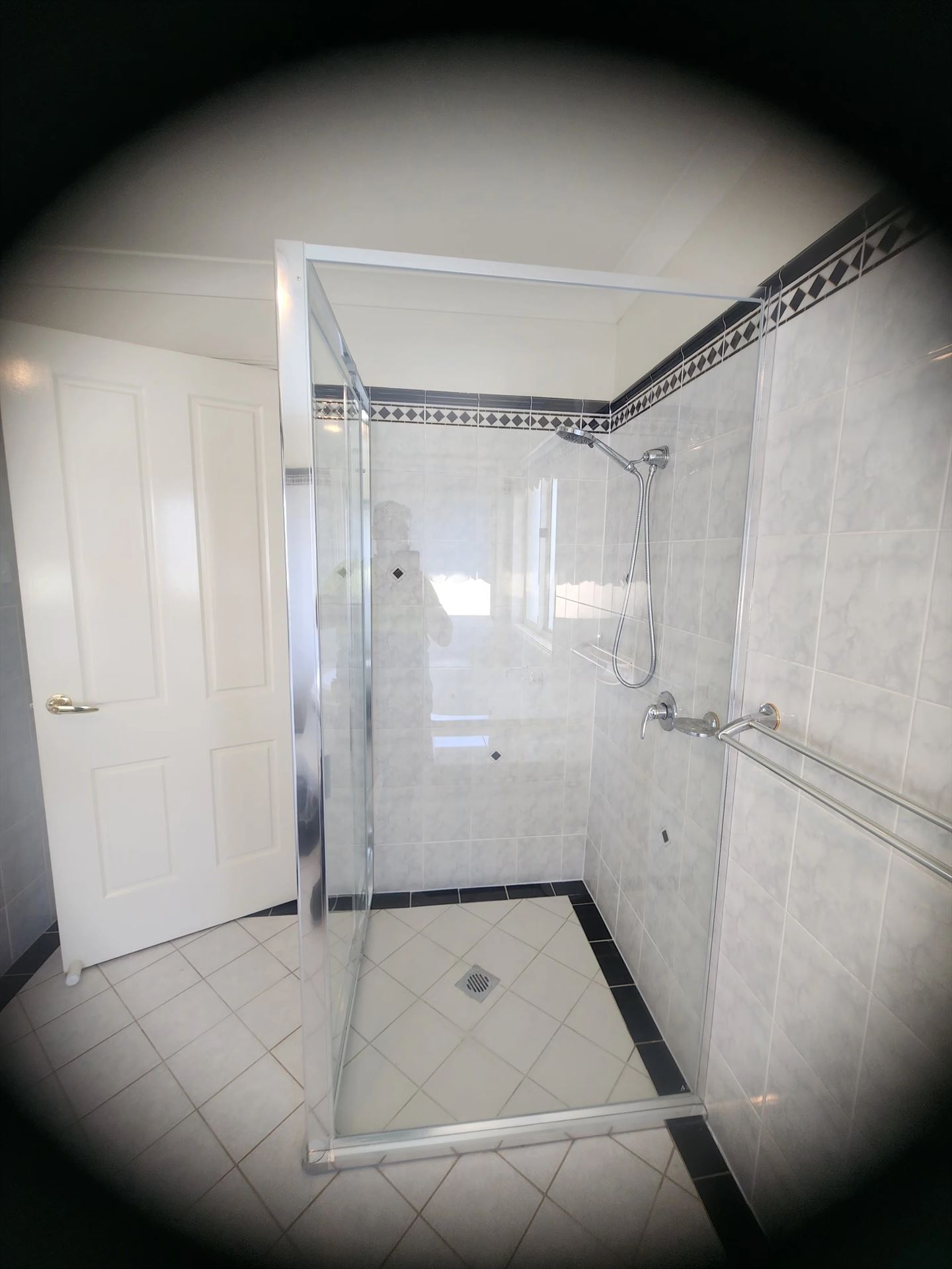 fully shower screen with chrome hardware installed in Castle Hill by Showerland