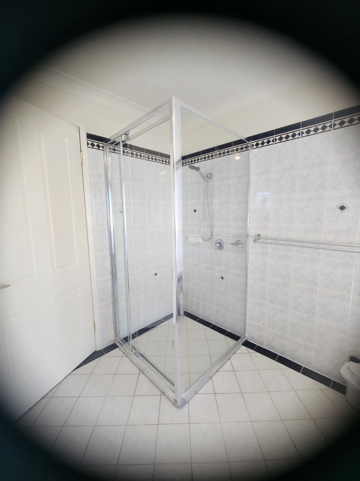 fully shower screen with chrome hardware installed in Castle Hill by Showerland