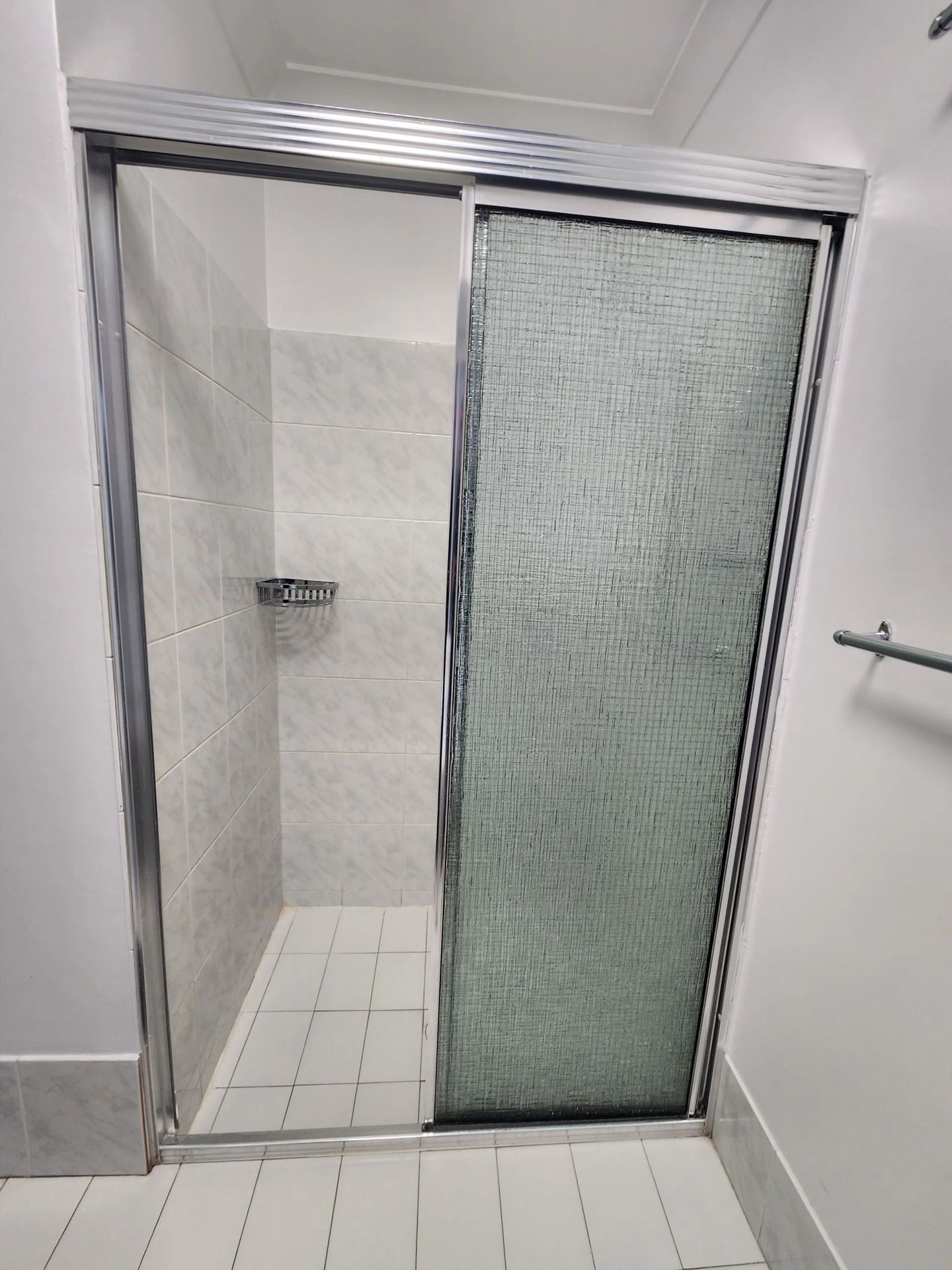 fully shower screen with chrome hardware installed in Bossley Park by Showerland