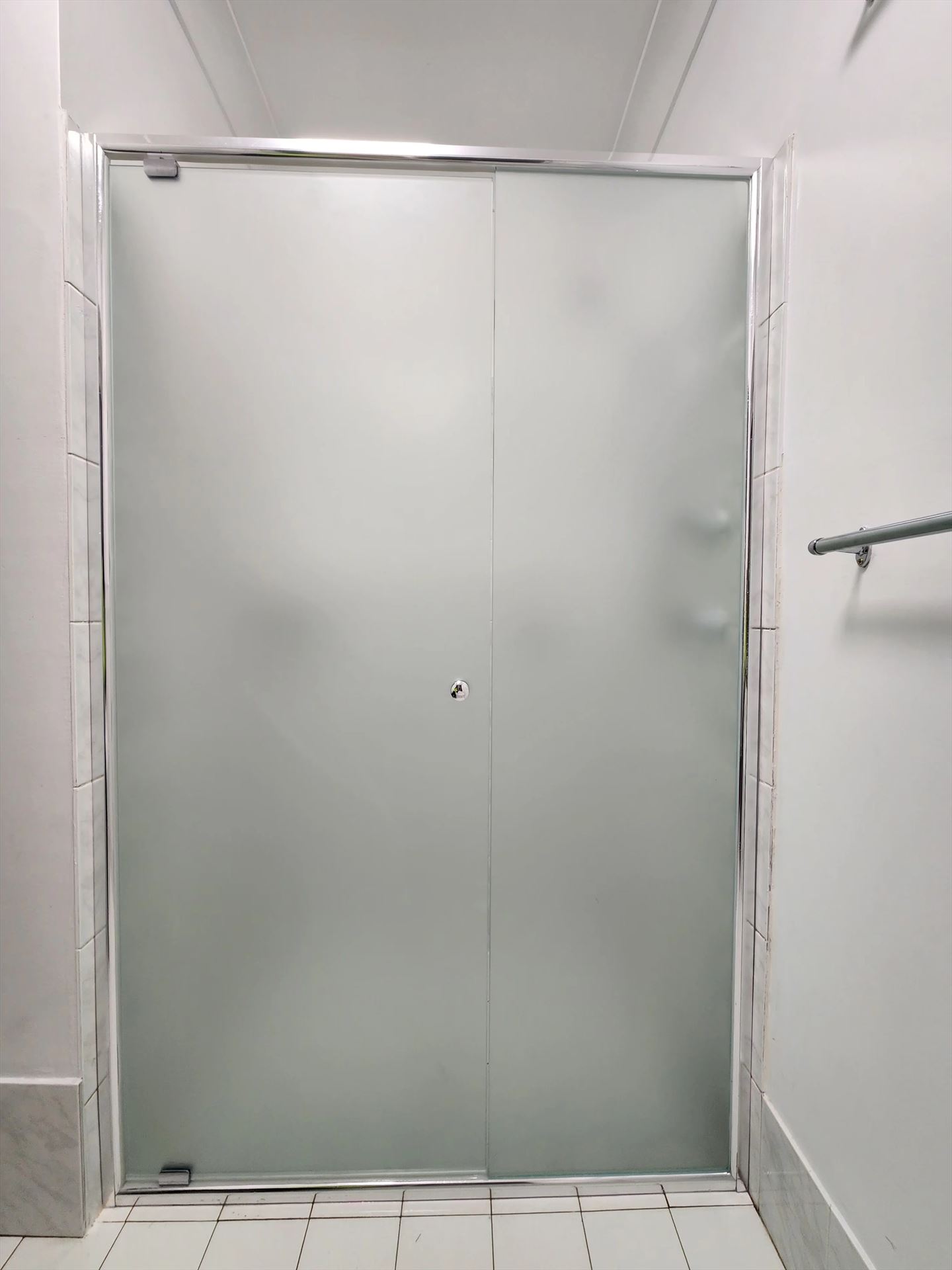 semi shower screen with chrome hardware installed in Bossley Park by Showerland