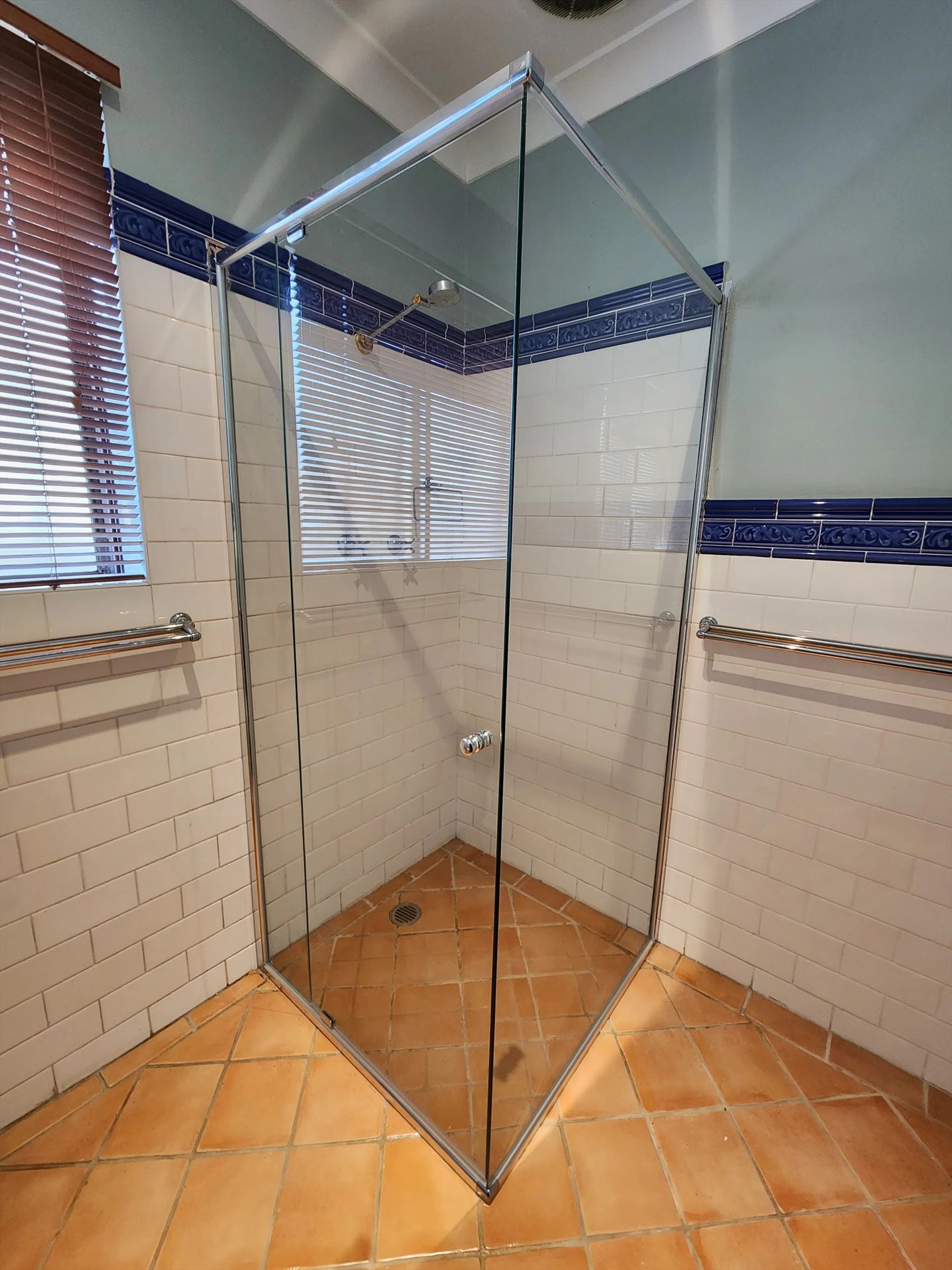 semi shower screen with chrome hardware installed in Haberfield by Showerland