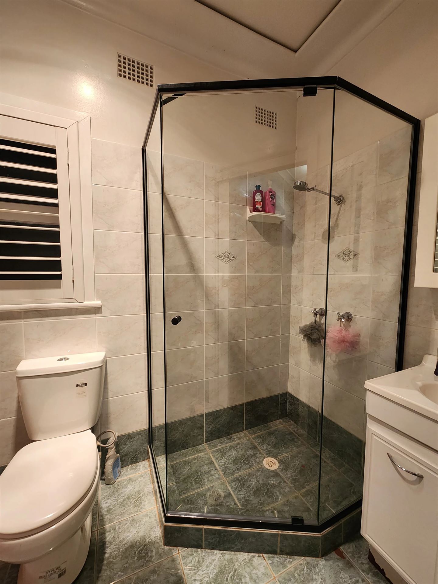 semi shower screen with black hardware installed in Constitution Hill by Showerland