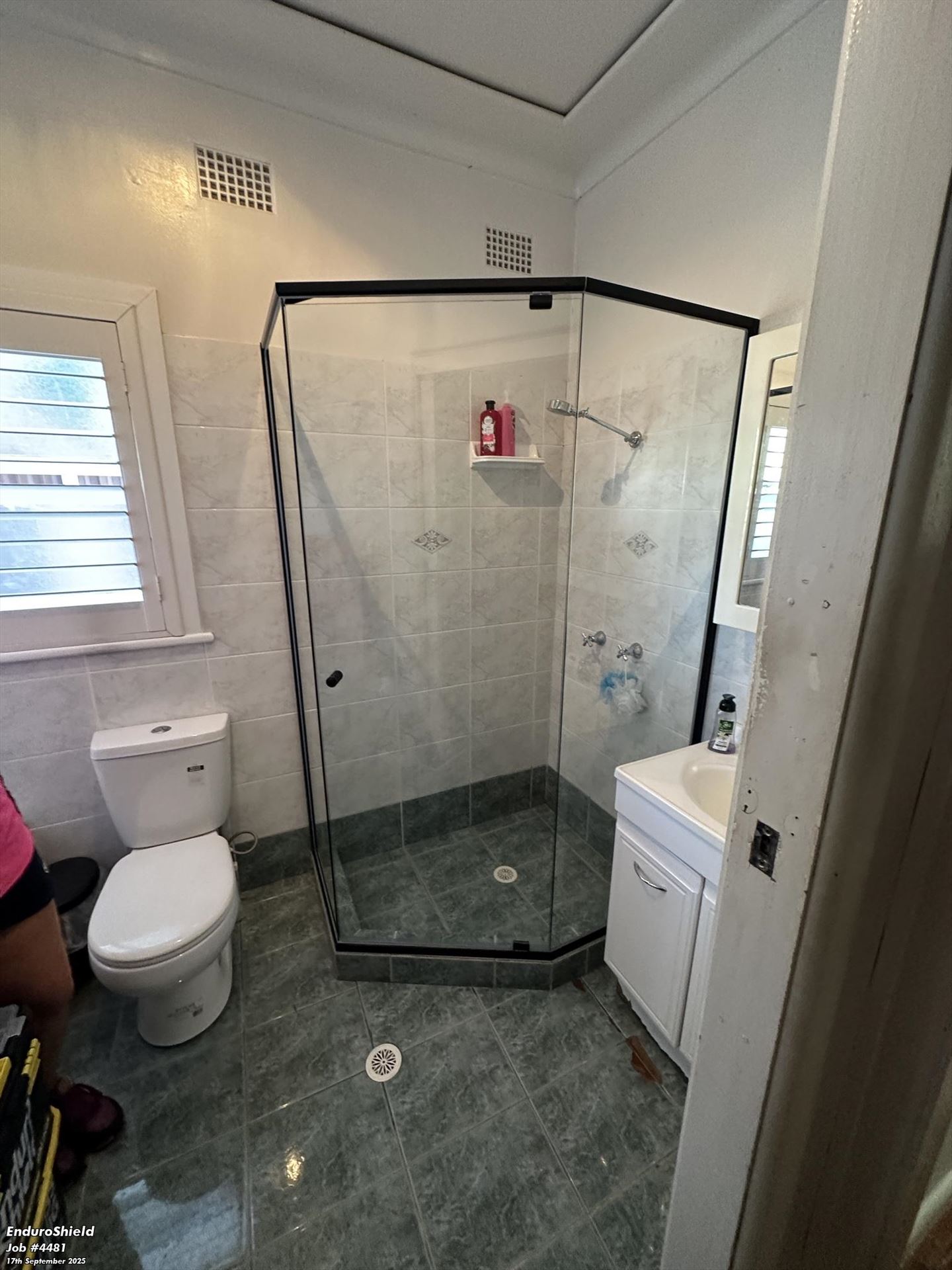 semi shower screen with black hardware installed in Constitution Hill by Showerland