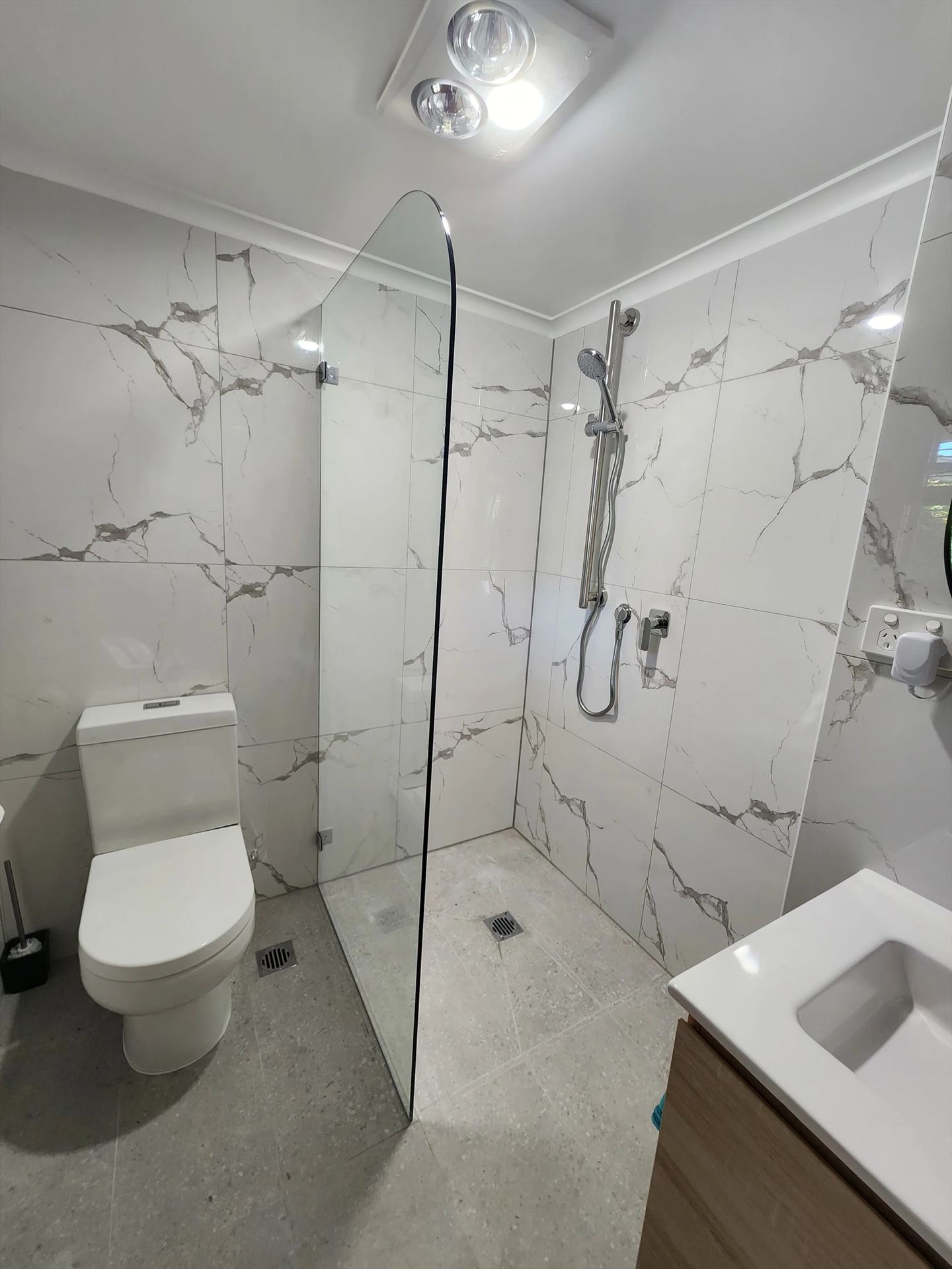 frameless shower screen with chrome hardware installed in Cherrybrook by Showerland